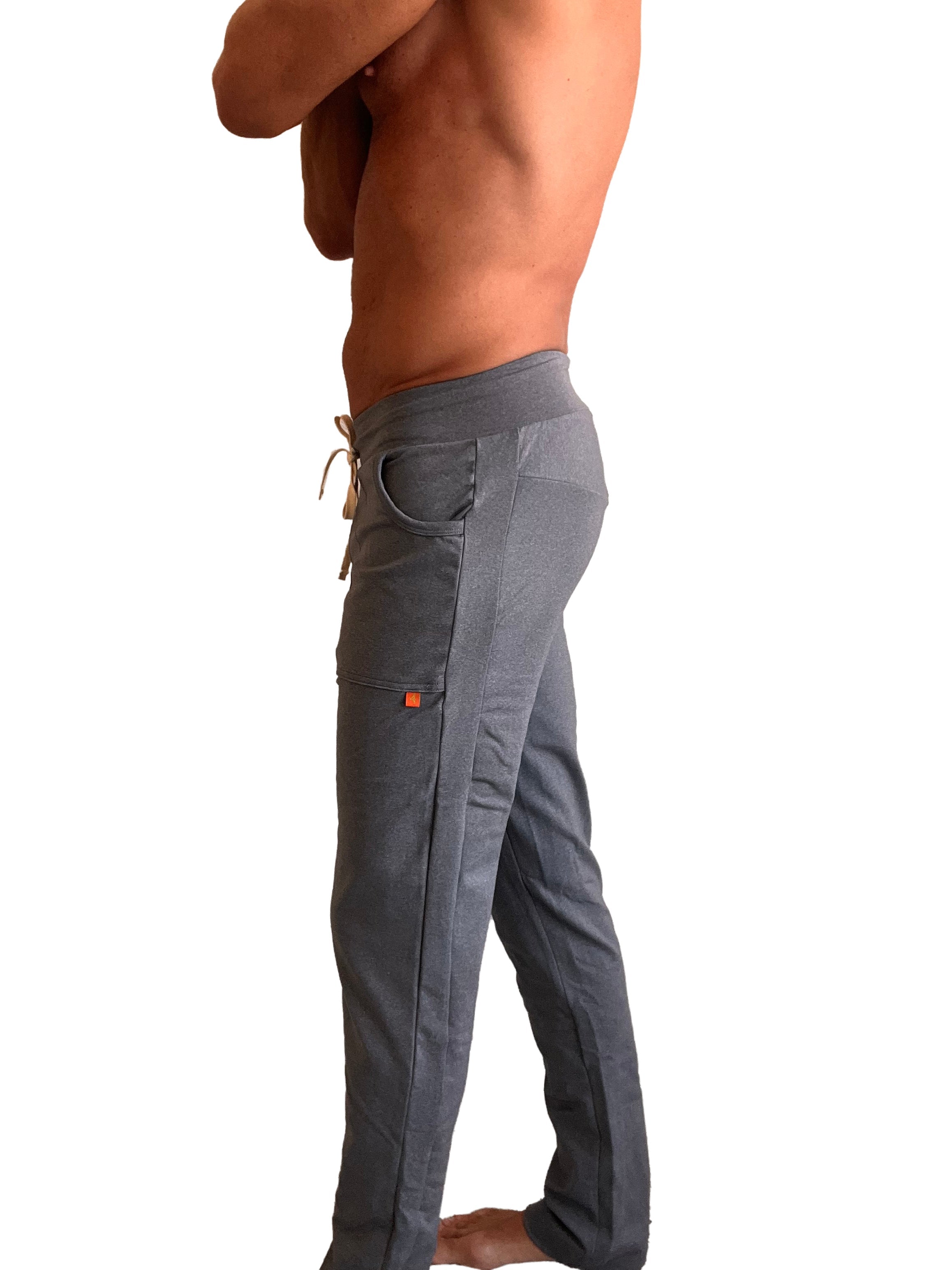 Performance premium track and lounge sweat pants in dark heather grey with drawstring waistband multiple pockets and orange tag