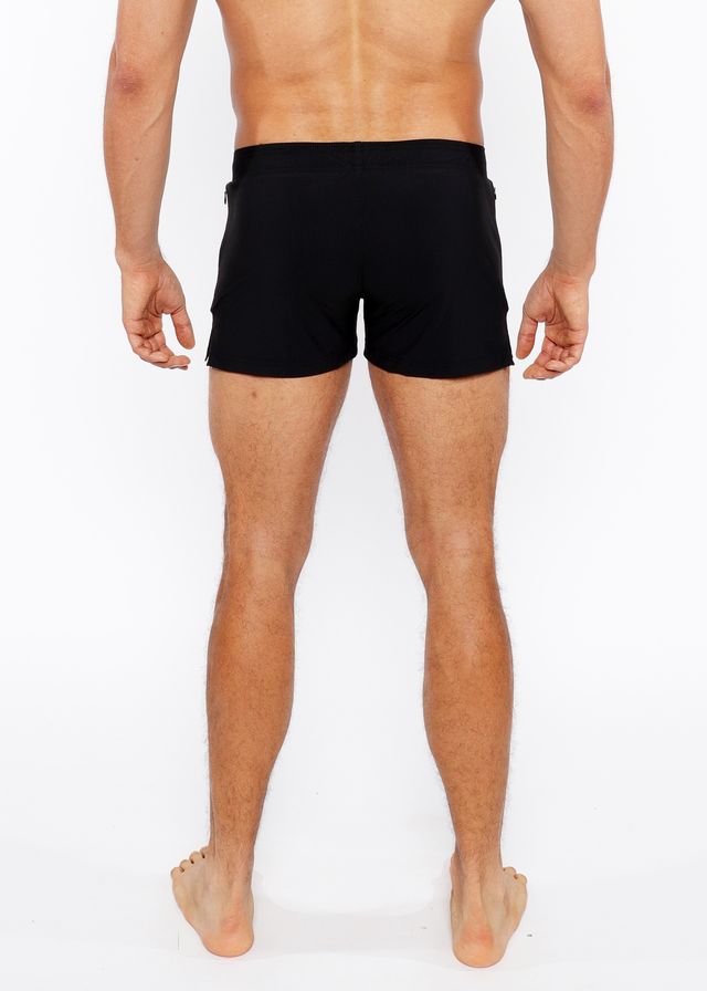 Black pinstripe swim short with sleek form fitting design and subtle side pockets for comfortable wear