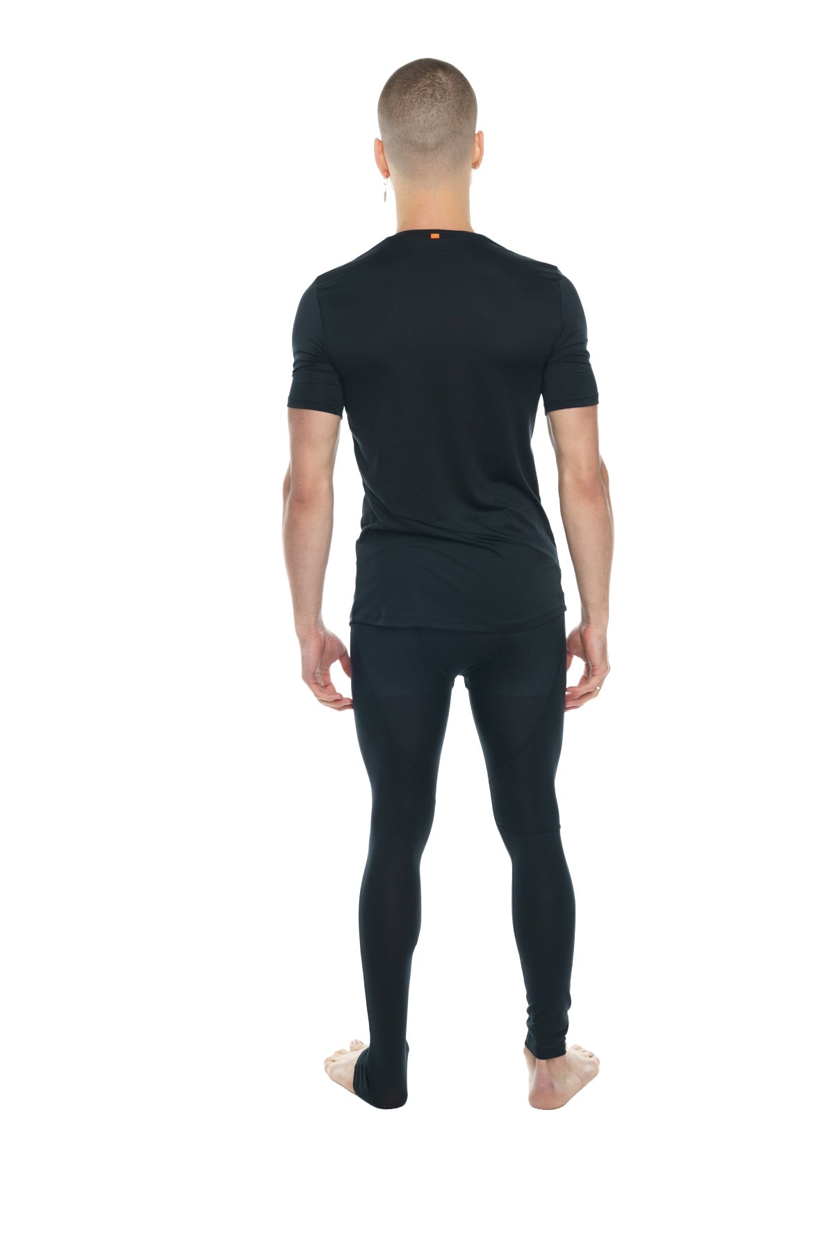 Black carbon perfect pocket crew neck tee paired with black seamless form fitting short sleeve and full length leggings set