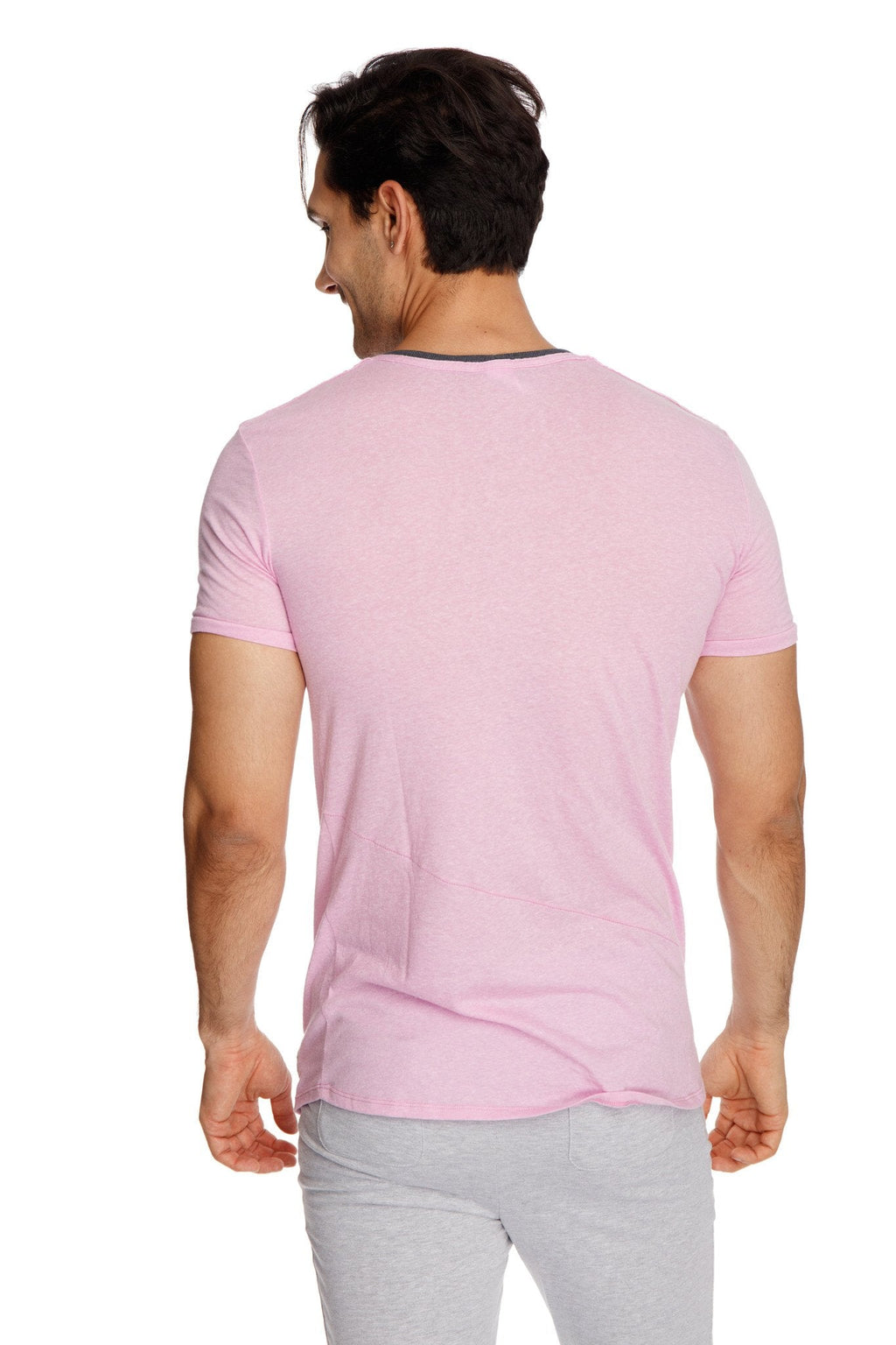 A soft pink perfect pocket crew-neck tee in iris slub fabric with short sleeves and dark gray neckline trim