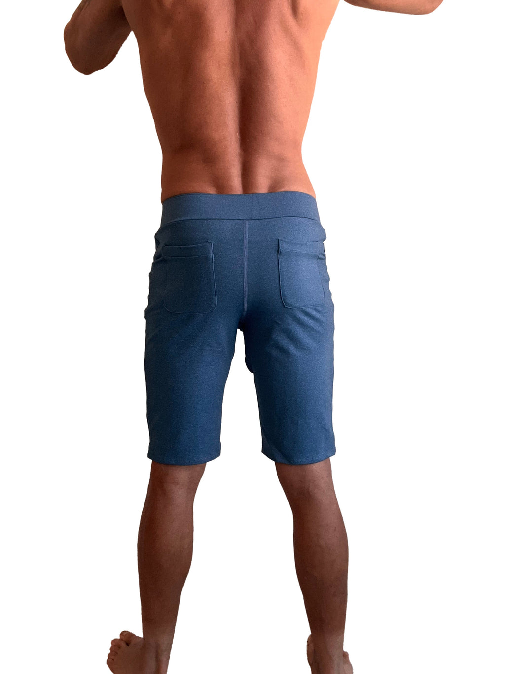Back view of performance premium urban tactical dress shorts in coral blue heather with fitted waistband and two rear pockets