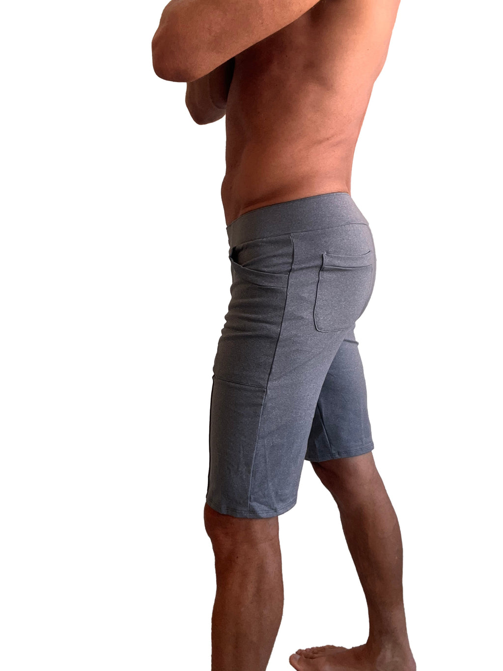 Performance premium urban tactical dress shorts in dark heather grey with relaxed fit side pockets and subtle textured fabric