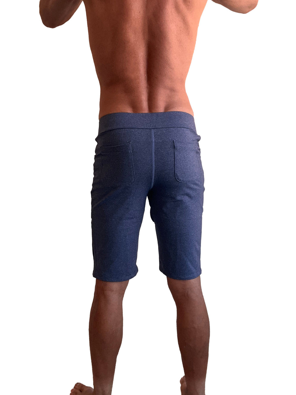 Back side of navy blue heather performance premium urban tactical dress shorts with elastic waistband and two pockets