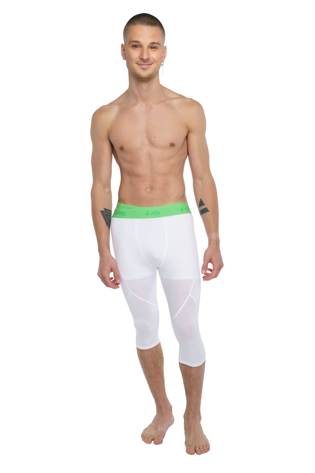 White capri-length performance yoga leggings with bright green elastic waistband designed for active wear