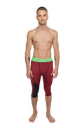 Performance yoga leggings 3/4 in brick red heather with maroon and black fabric and bright green waistband