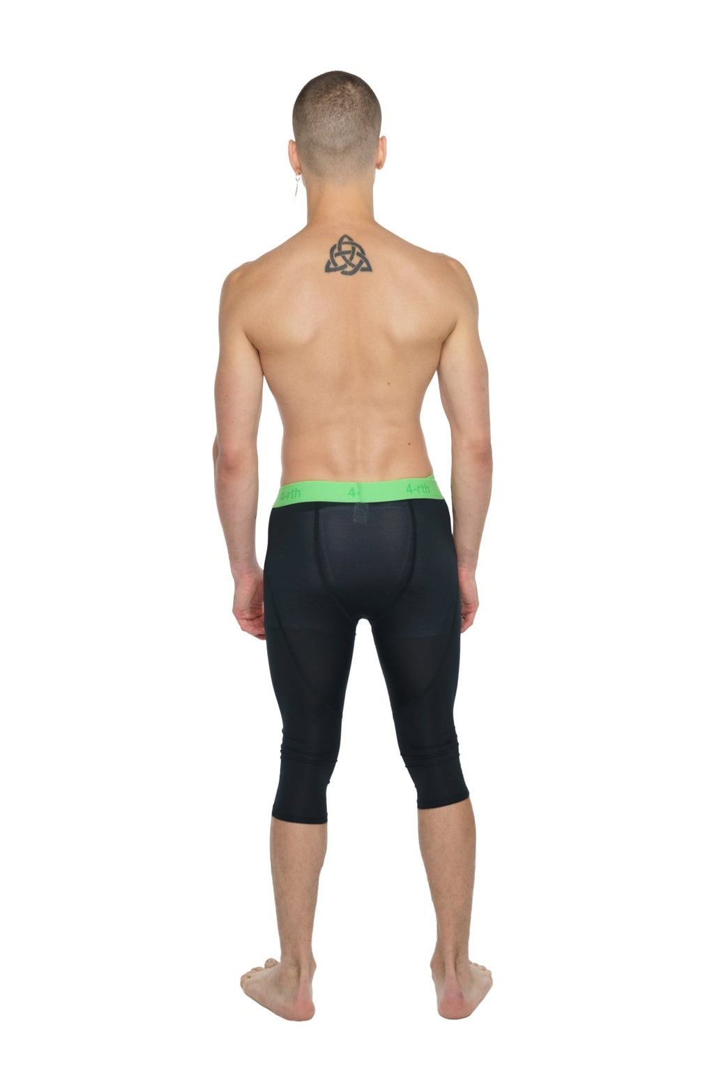 Black compression performance yoga leggings with bright green waistband 3/4 length in carbon black
