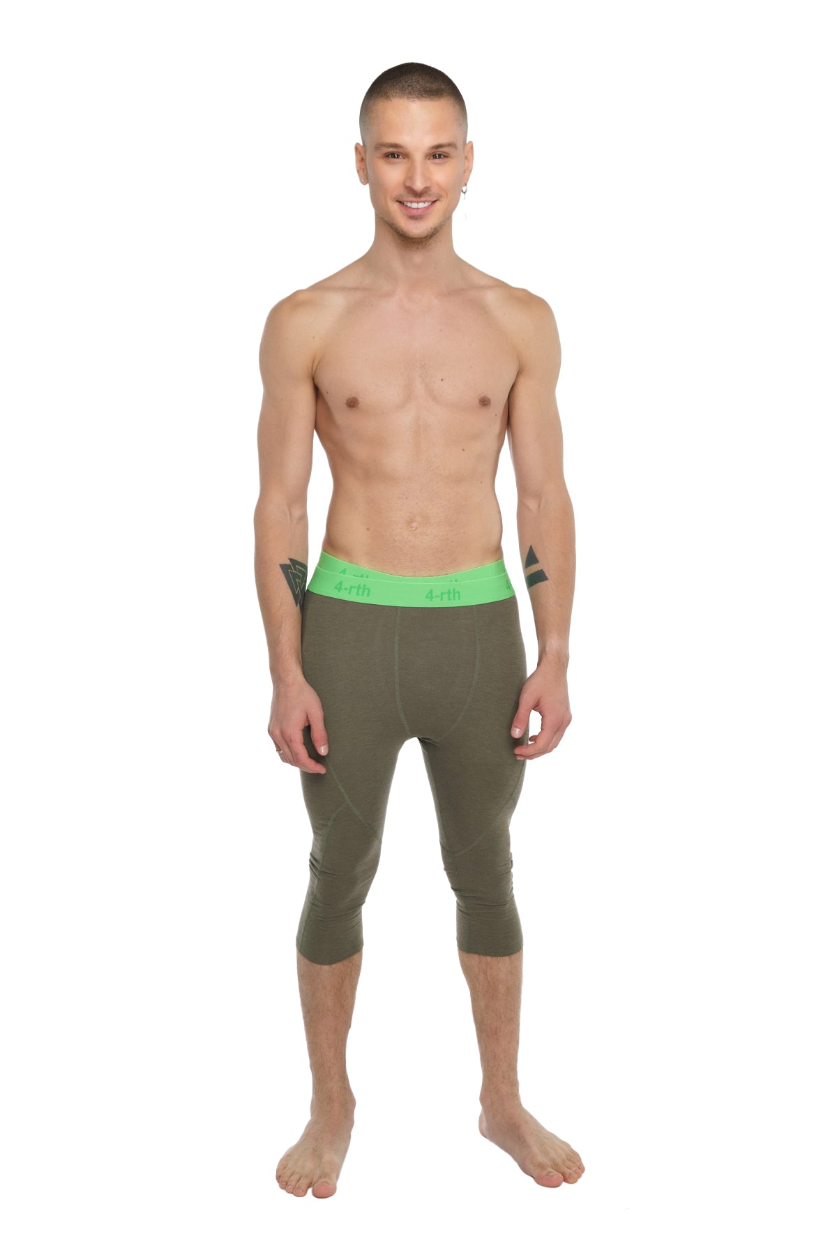 Olive green capri-length calvin klein performance yoga leggings with neon green waistband for active wear