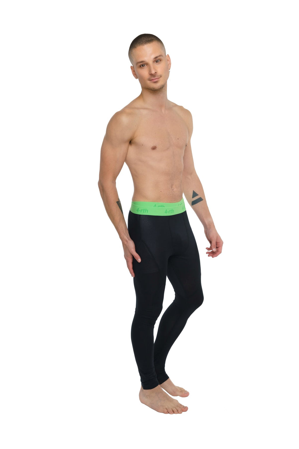 Performance yoga leggings in carbon black with bright green calvin klein logo waistband for active wear