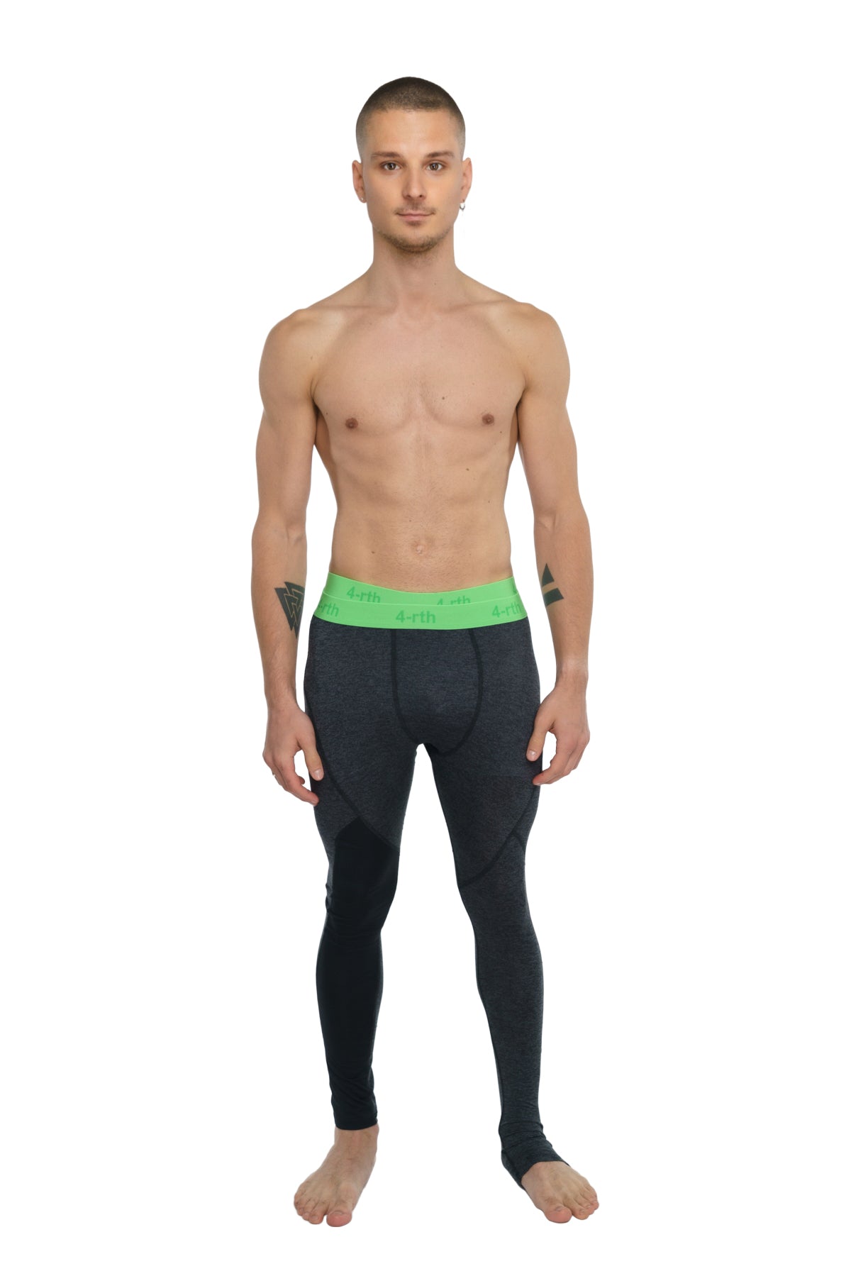 Black performance yoga leggings with bright green waistband and white text in charcoal heather fabric
