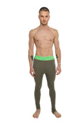 Olive green performance yoga leggings with bright neon green calvin klein logo waistband in stretchy fabric