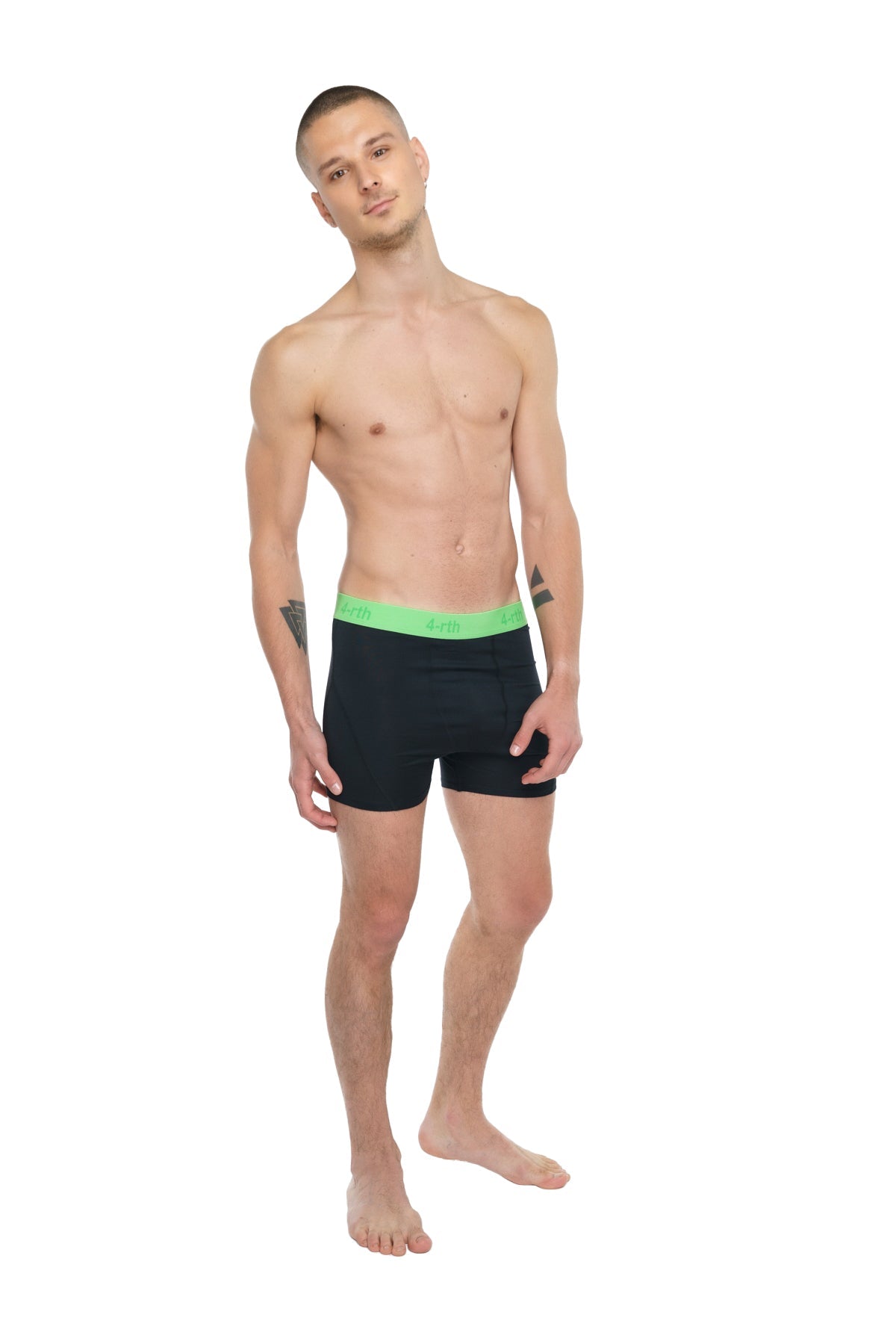 Black performance yoga leggings short in carbon black with vibrant neon green waistband for active wear