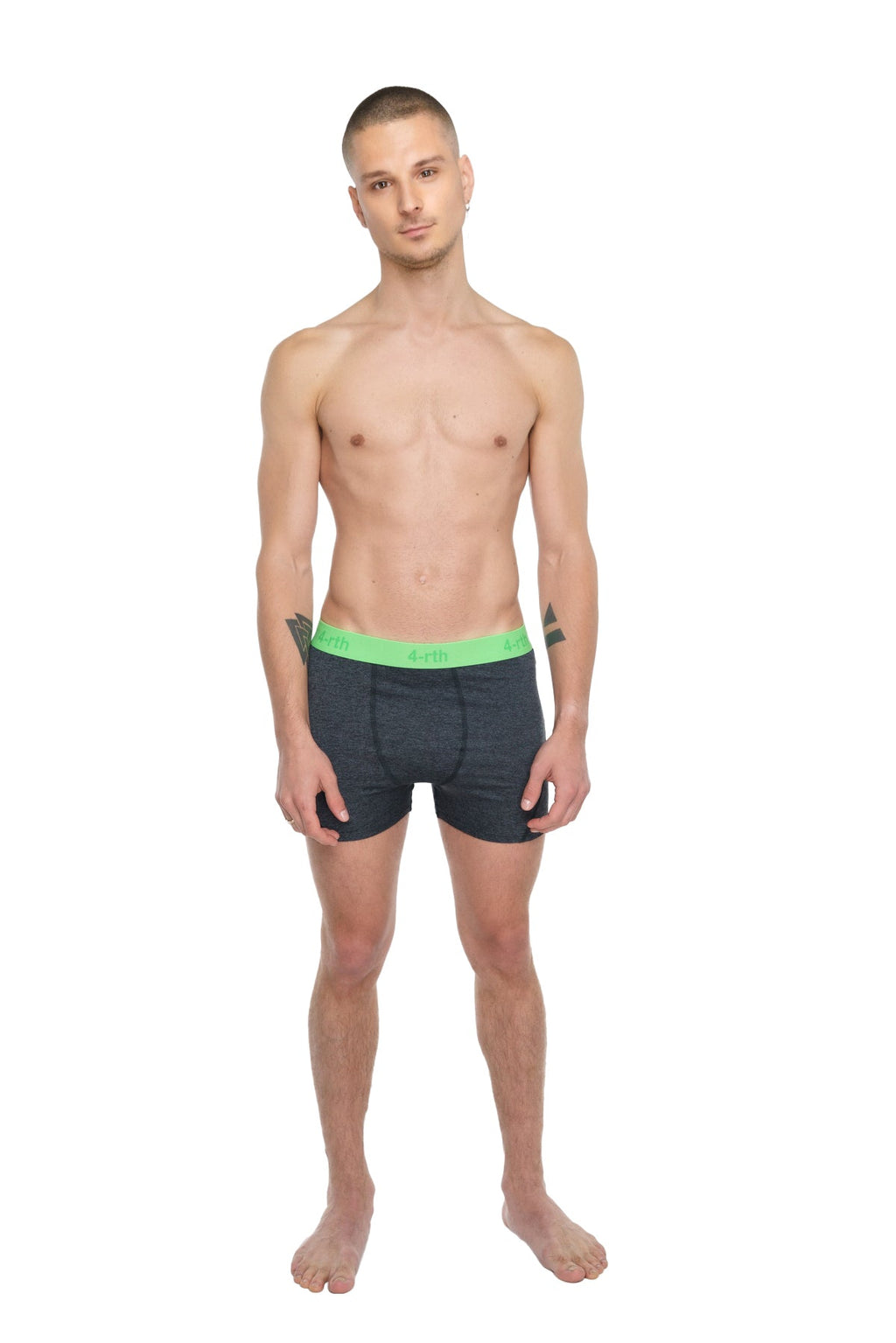 Dark gray boxer briefs with bright green elastic waistband designed for performance yoga and active wear