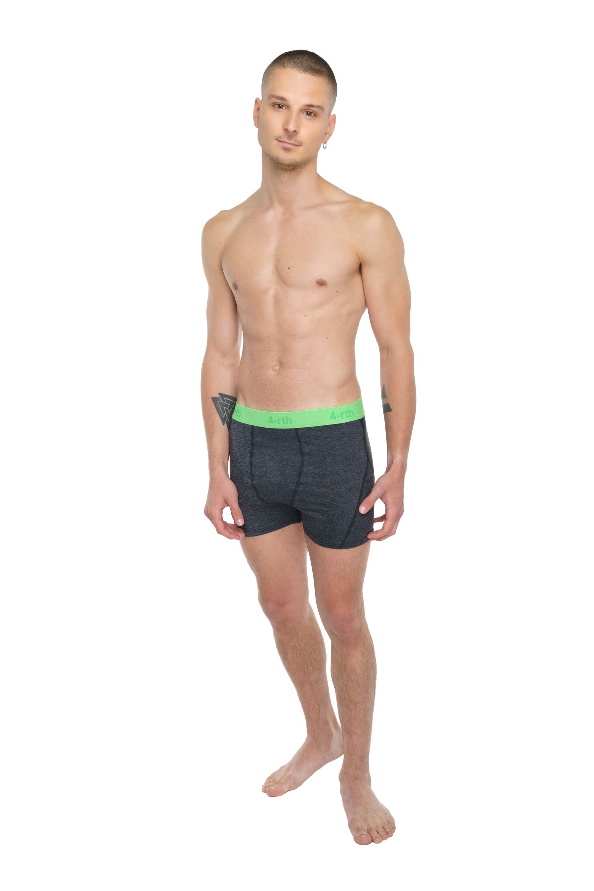 Dark gray boxer briefs with bright neon green logo waistband designed for performance yoga in charcoal heather material