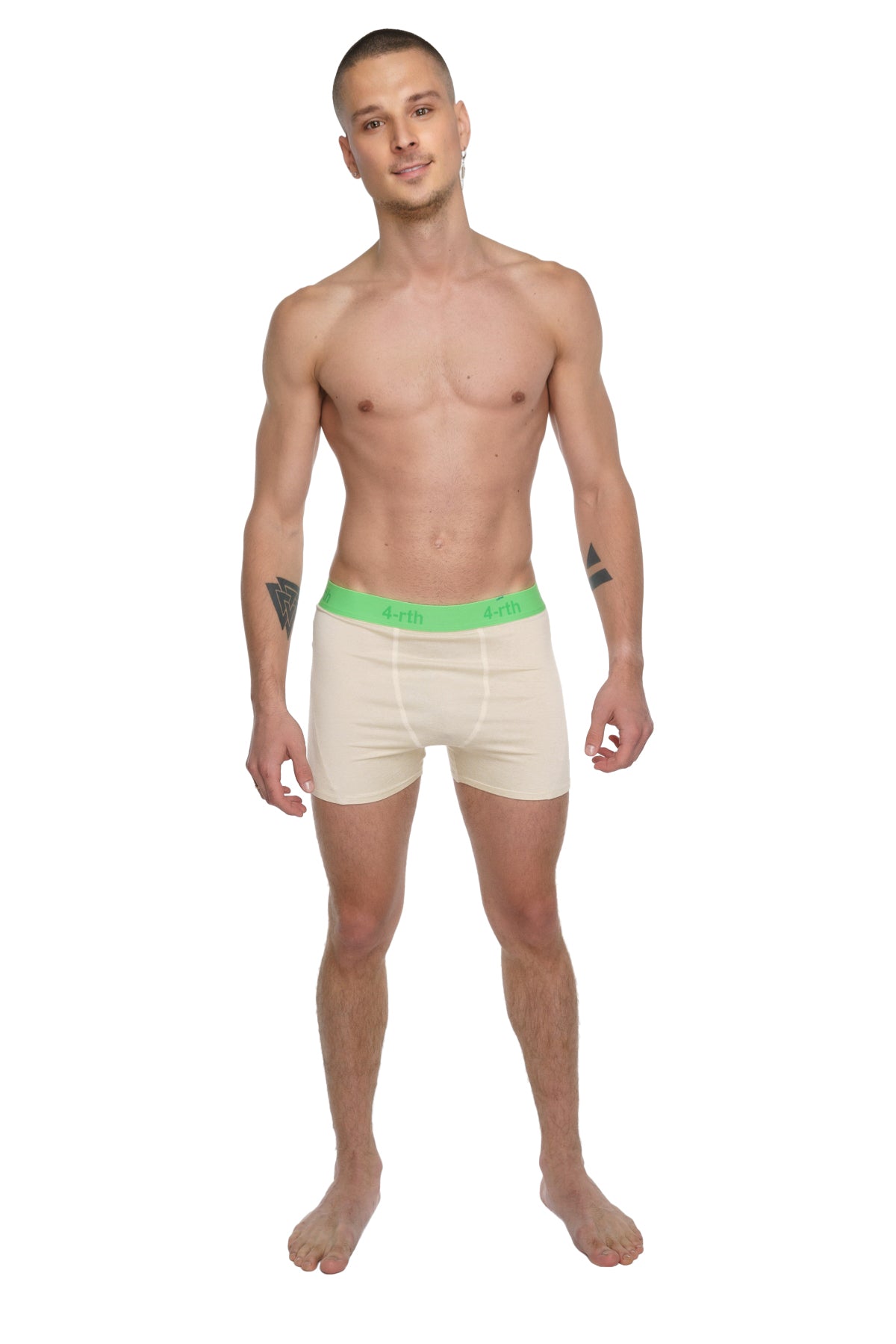 Cream-colored boxer briefs with bright green elastic waistband featuring brand logo in performance yoga leggings short sand beige
