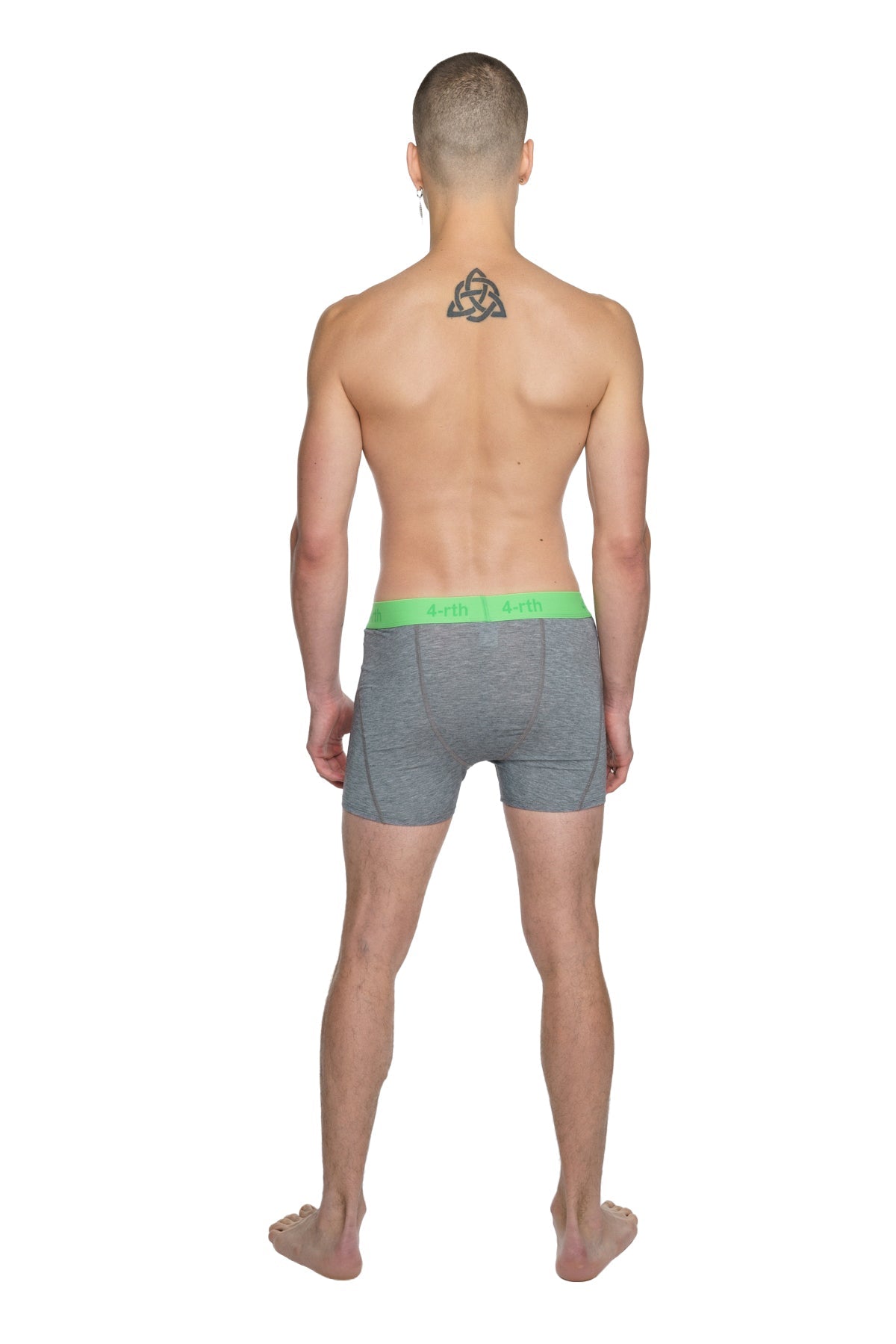 Gray boxer briefs with bright green waistband and a.p.c. branding featured in performance yoga leggings short steel heather design