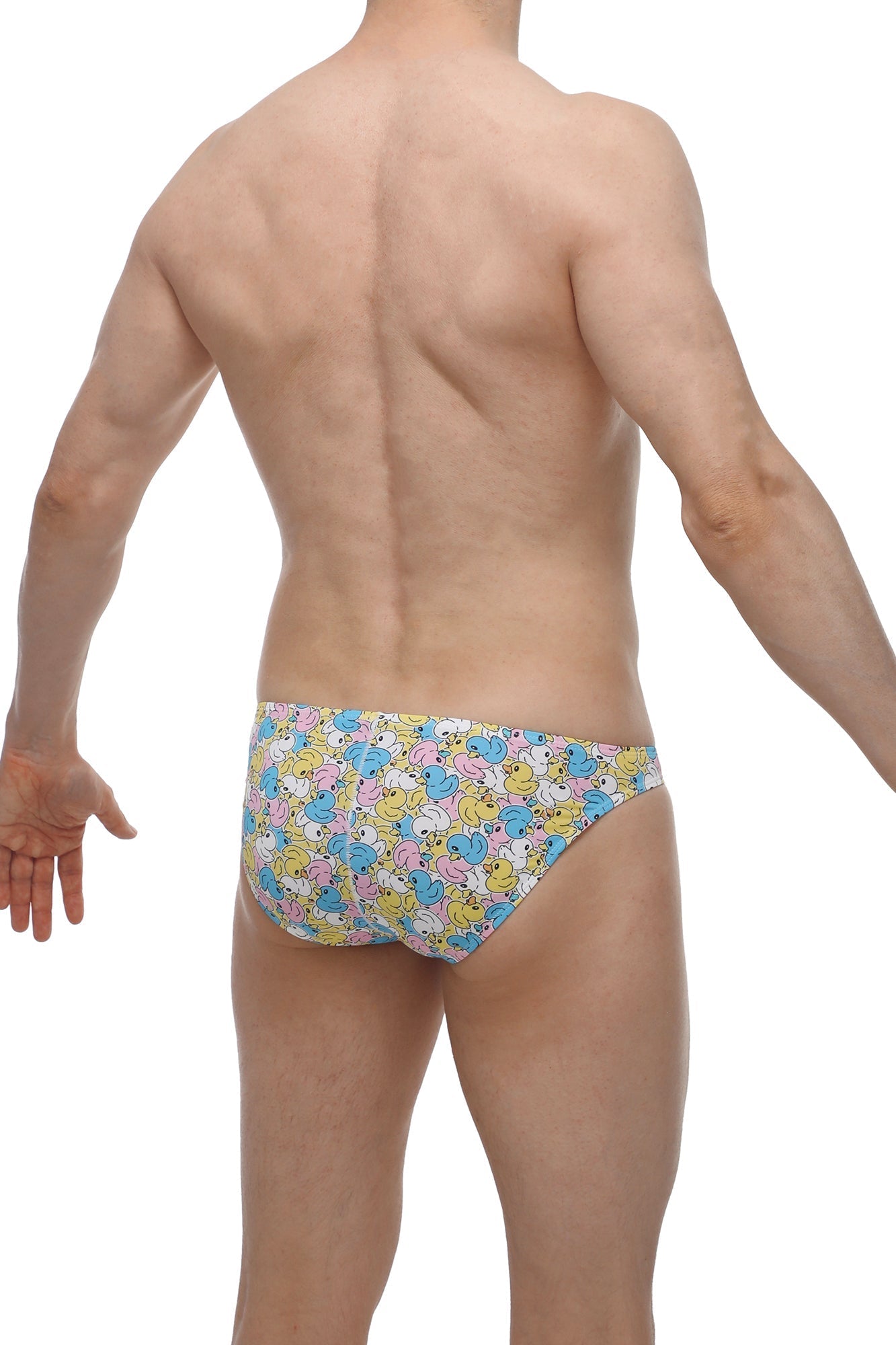PetitQ bikini Chill Duckies brightly colored swim trunks with pastel yellow blue and pink cartoon ducks on white background
