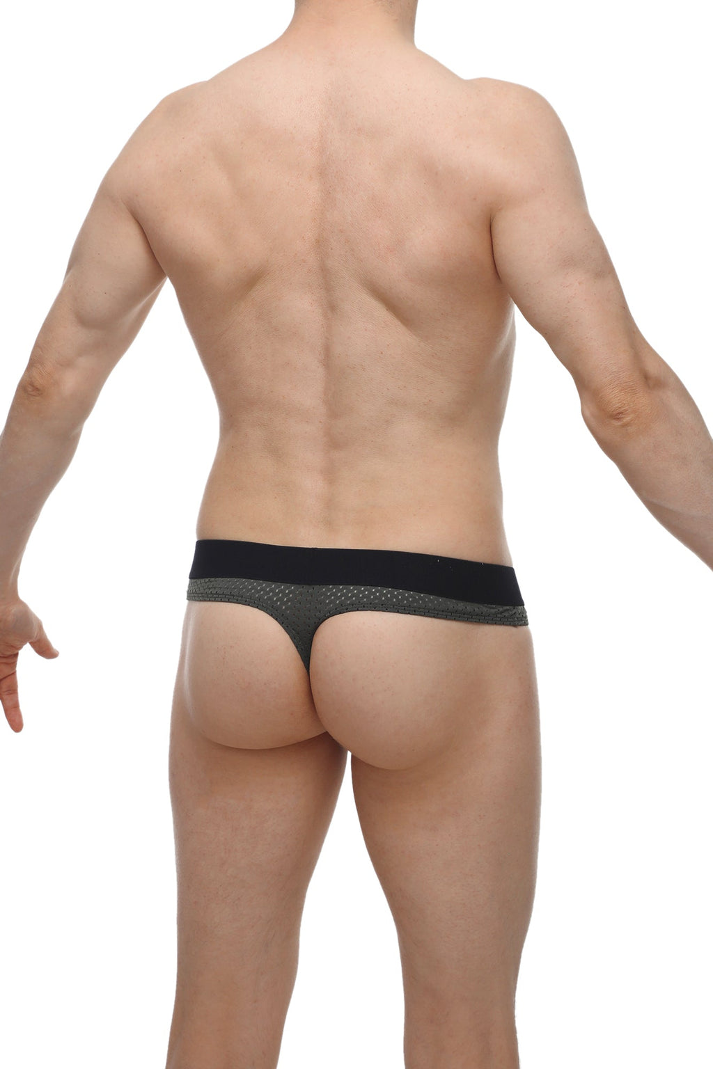 Black and gray mesh briefs with solid black waistband paired with PetitQ thong hole cockring in bee green color