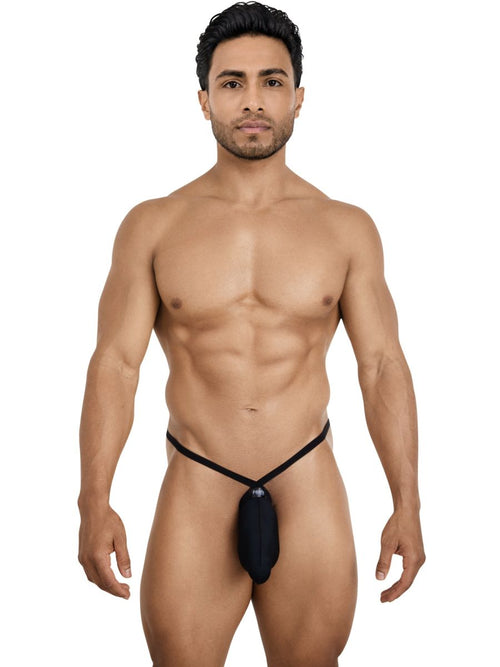 Model wearing a minimalist black Pikante G-string with a thin waistband and front pouch design for intimate wear.