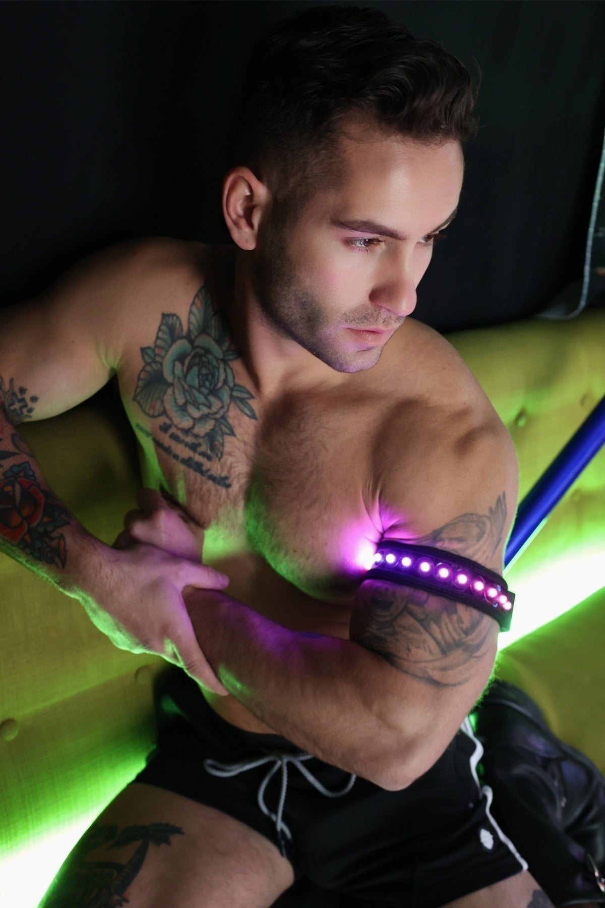 Prismaglow armband purple led light-up armband worn on a man’s upper arm for visibility and style