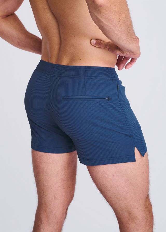 Navy blue riviera seersucker swim shorts with textured fabric mesh lining side zip pocket and hem cutout