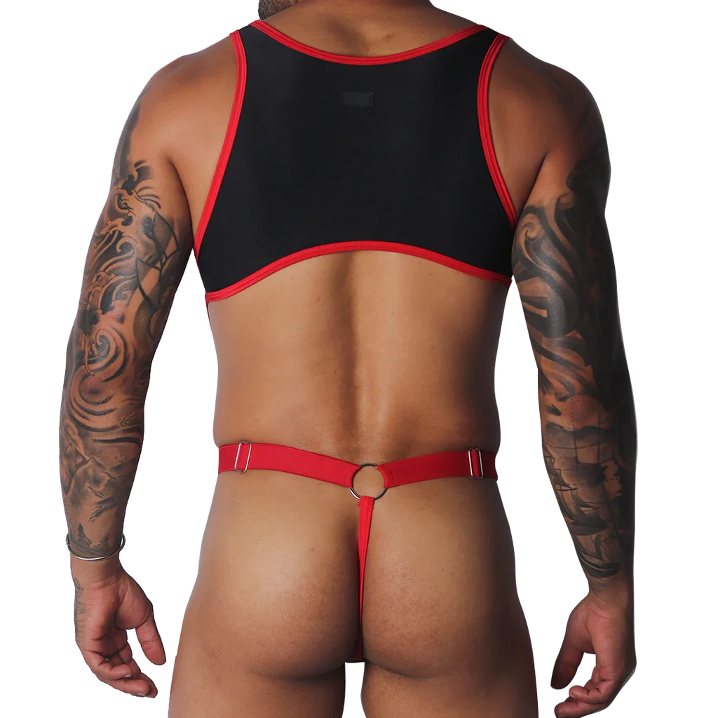 Black and red cropped tank top with thin shoulder straps paired with a red thong strap and metal ring detail.