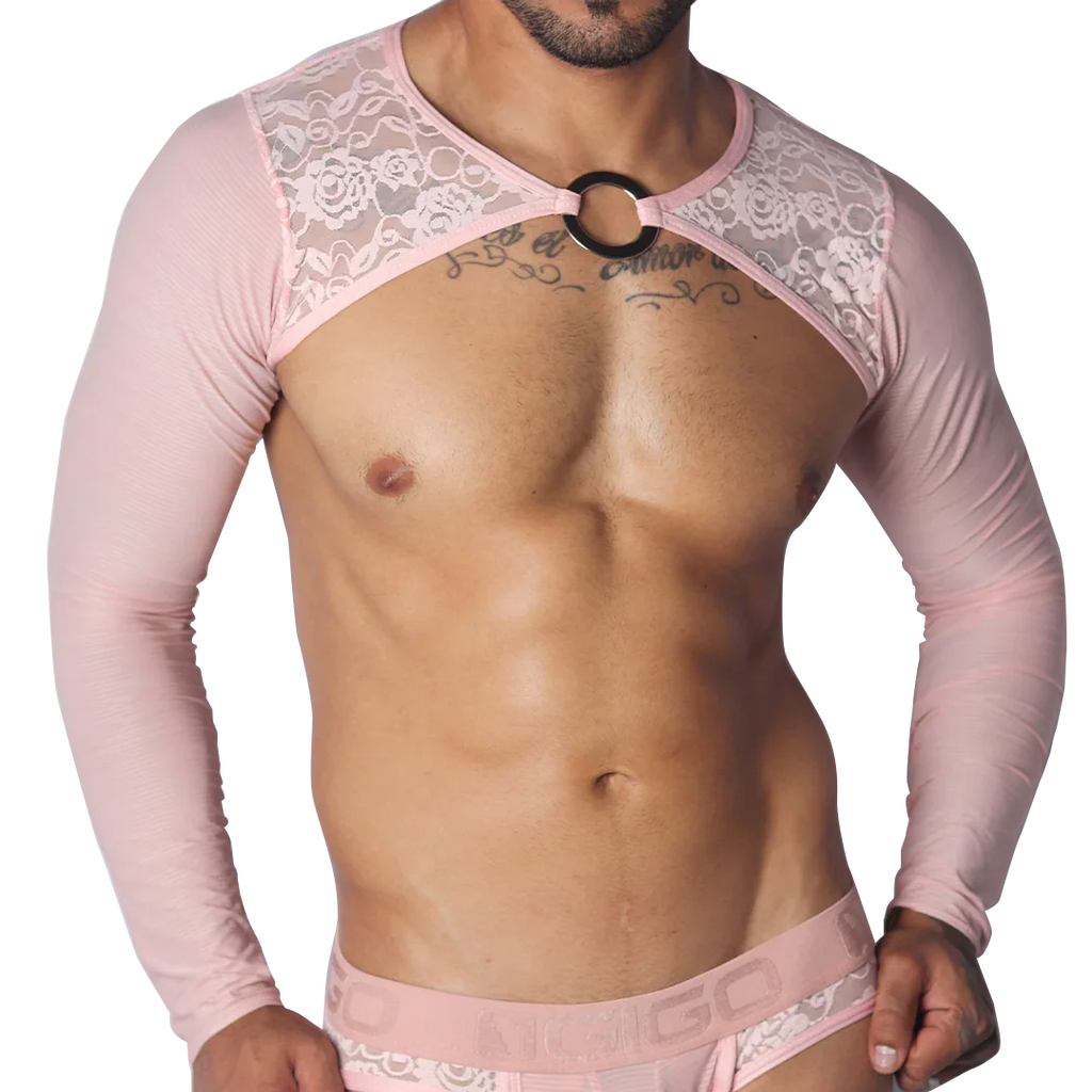 Pink long-sleeve crop harness featuring floral lace shoulder panels and a central metal O-ring chest connector.