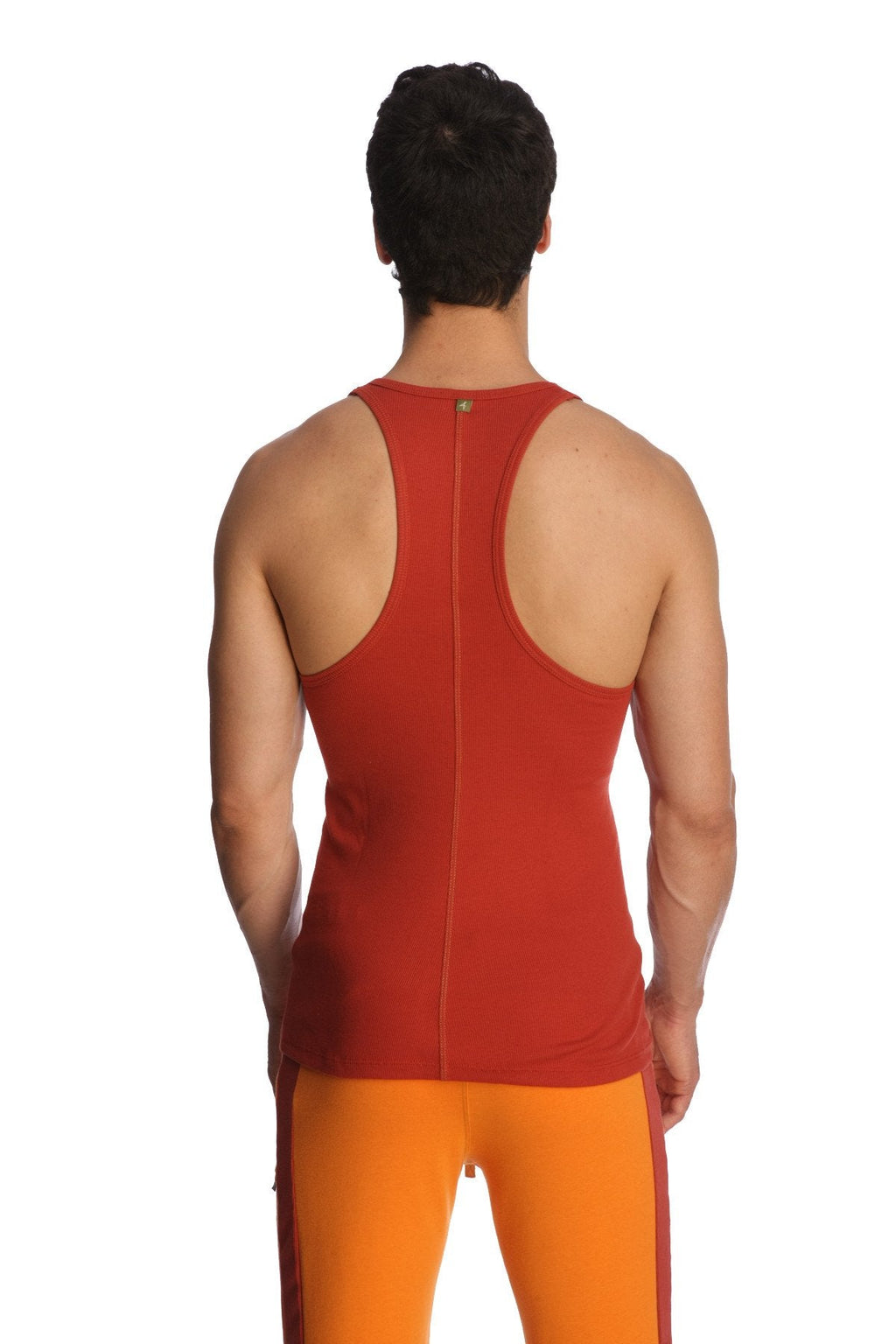 Back view of a cinnabar red racer-back yoga tank top with a central zipper down the back