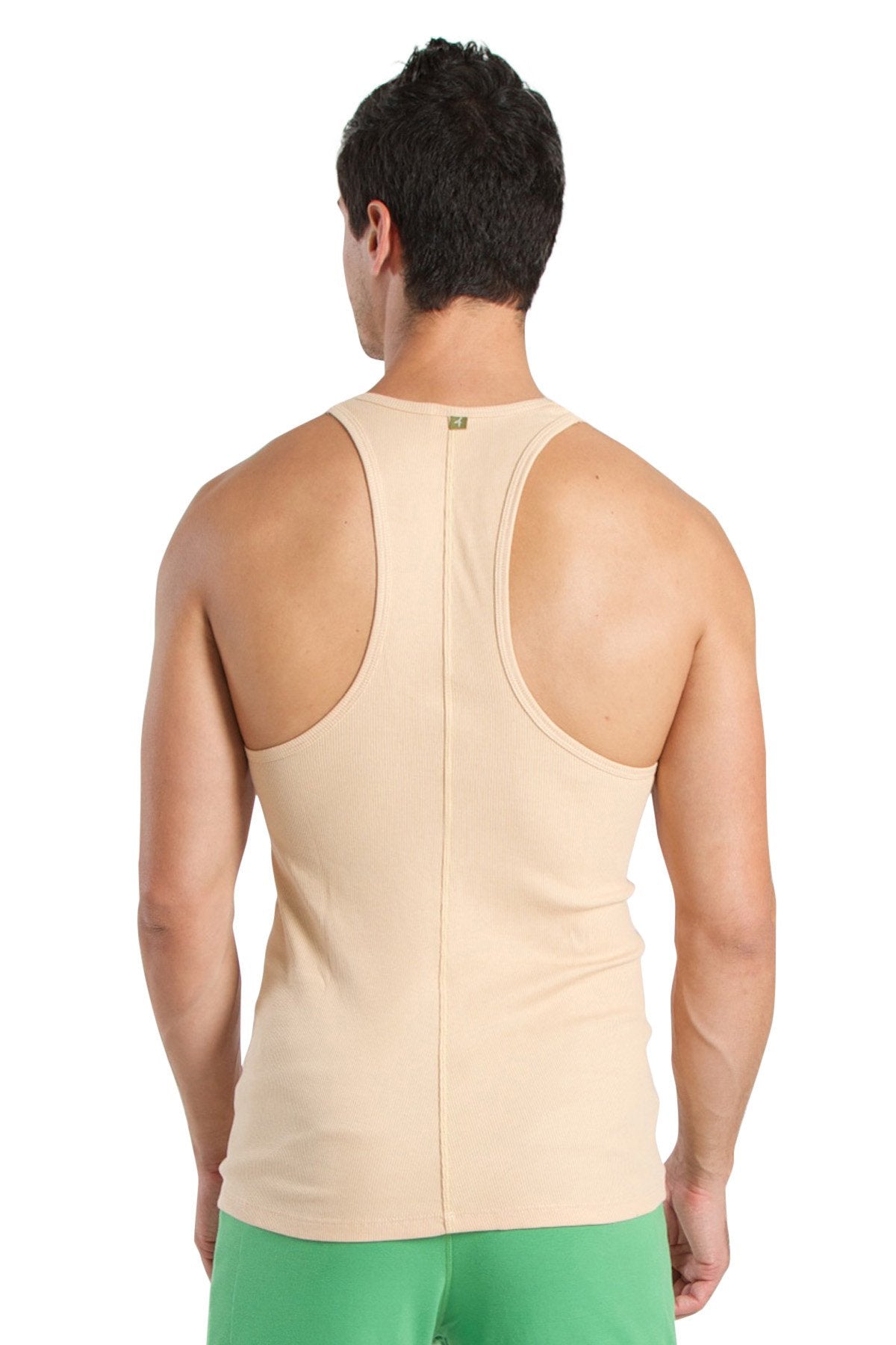 Beige racer-back yoga tank with central seam and subtle brand tag at neckline for activewear use