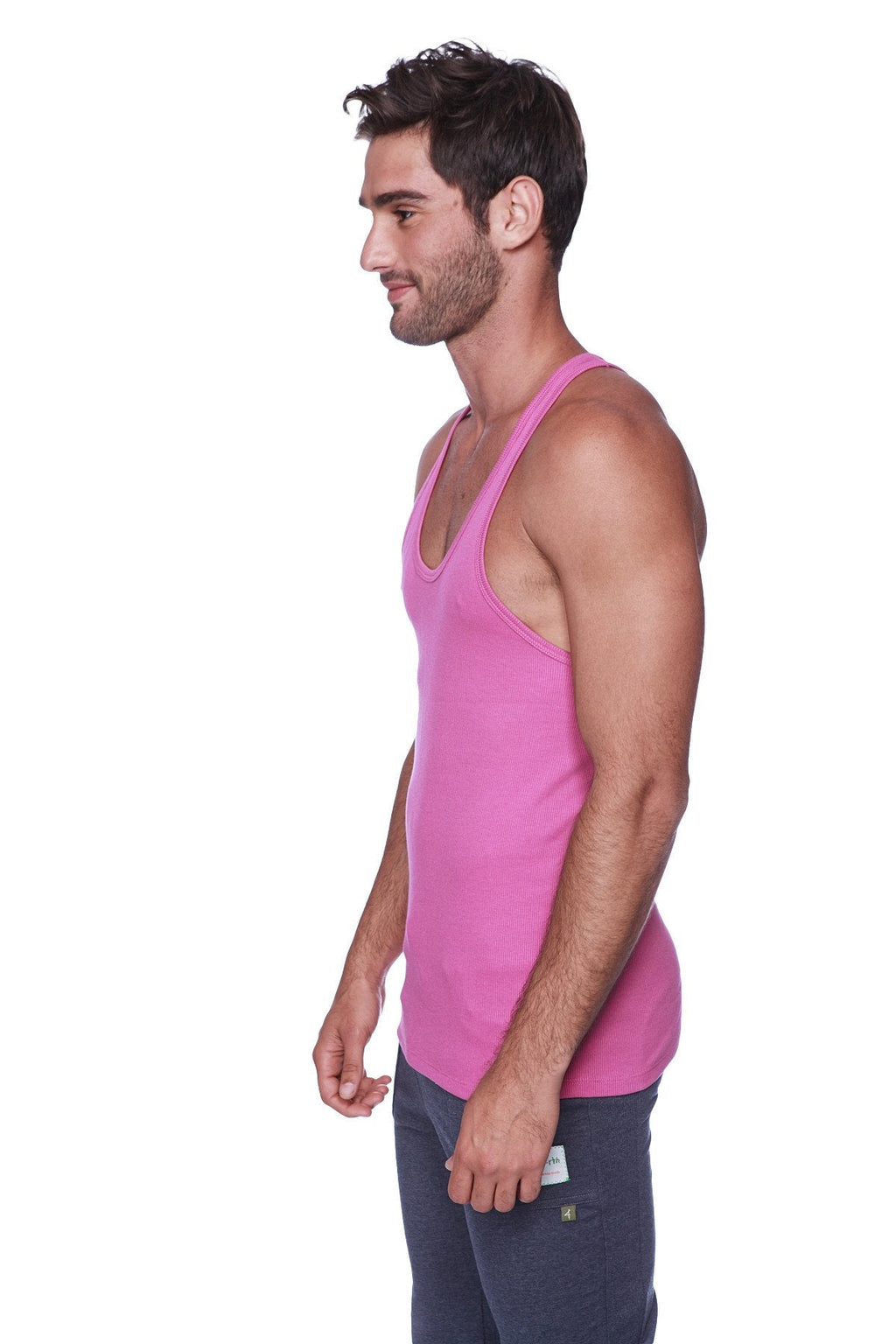 A vibrant pink sleeveless racerback yoga tank top made from smooth cotton fabric shown from the back side