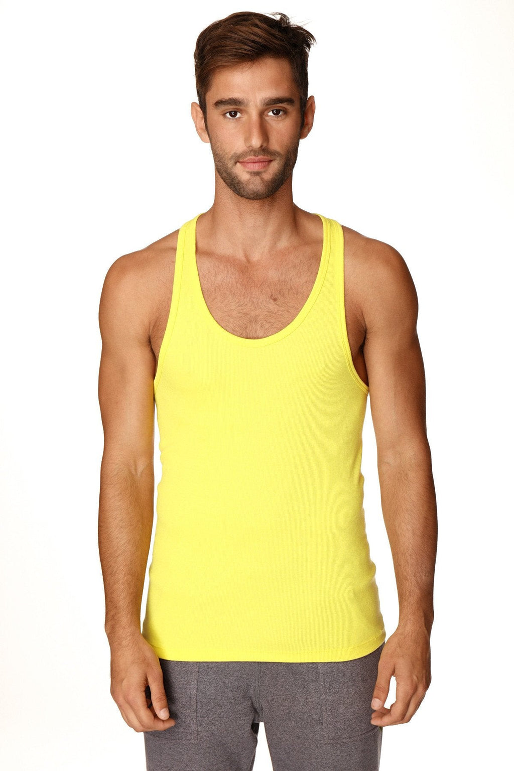Bright yellow racerback yoga tank top with simple fitted design perfect for workout and casual wear