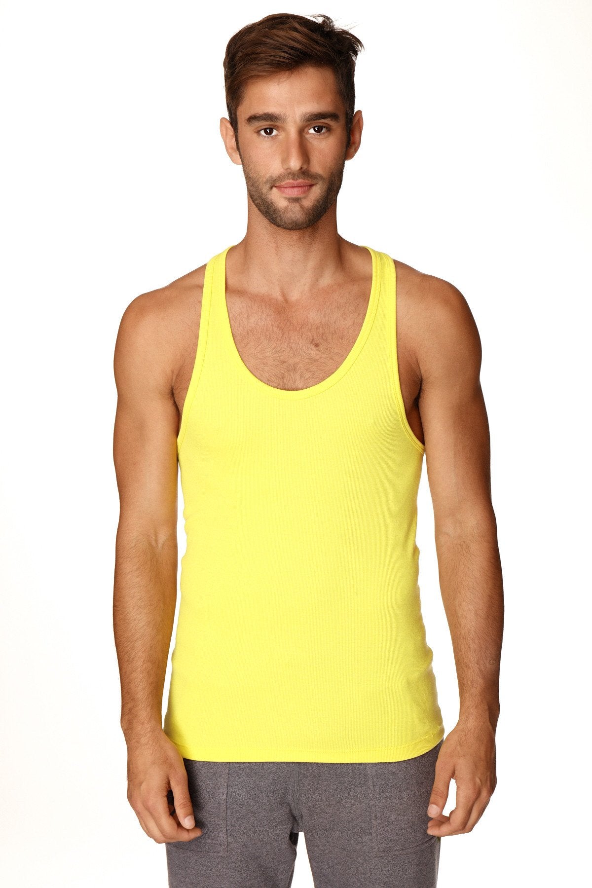 Bright yellow racerback yoga tank top with simple fitted design perfect for workout and casual wear