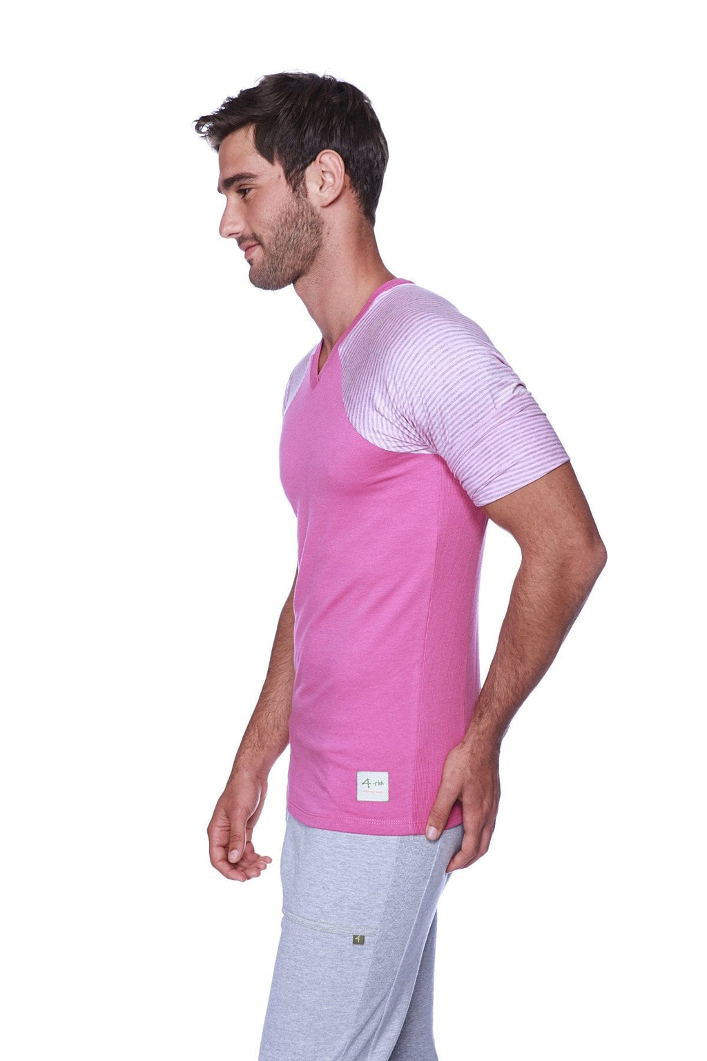 A vibrant pink and light purple striped raglan sleeve crew neck t-shirt with subtle texture in berry pink and grey