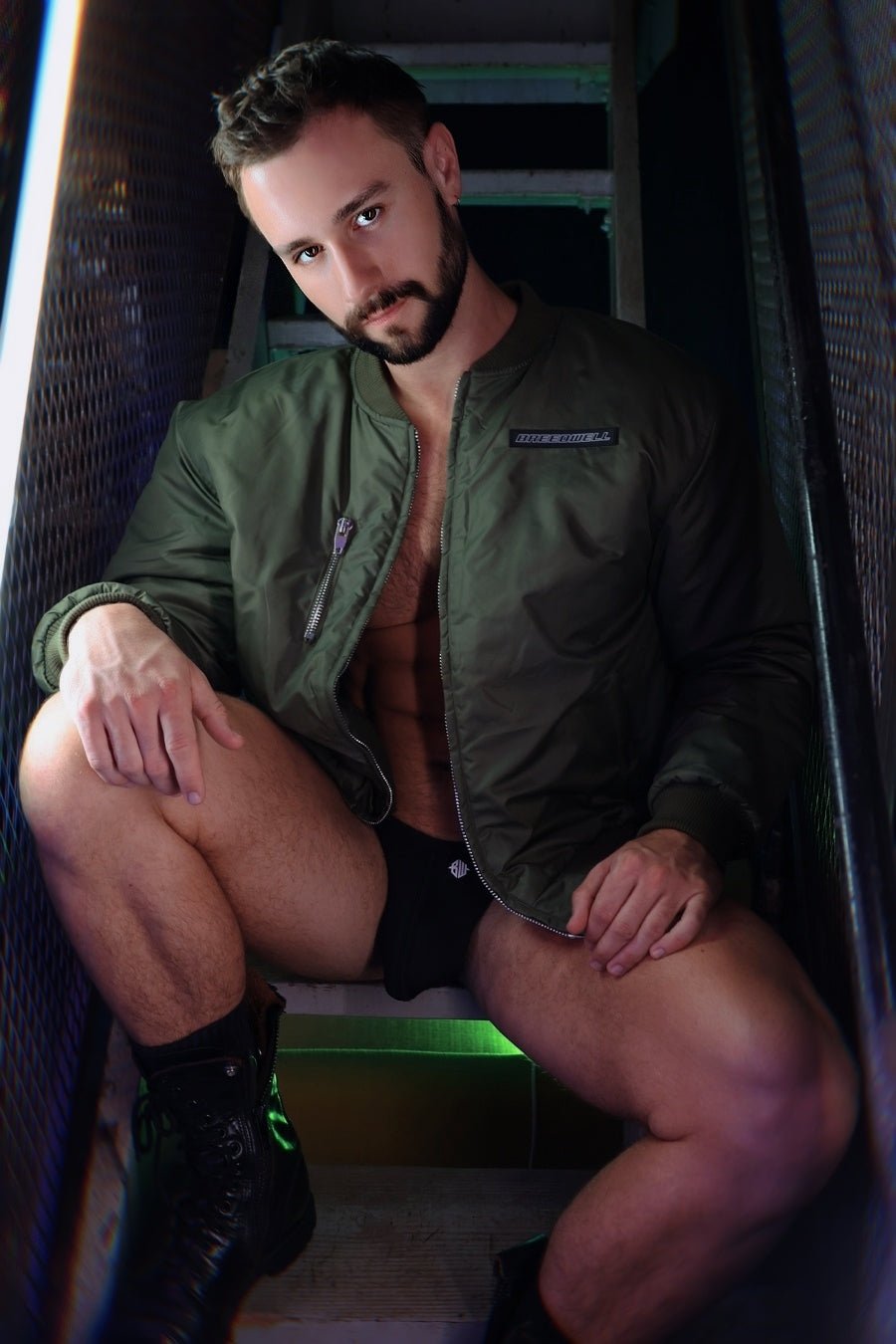 Olive green Renegade bomber jacket with zipper closure and small logo on left chest in lightweight material