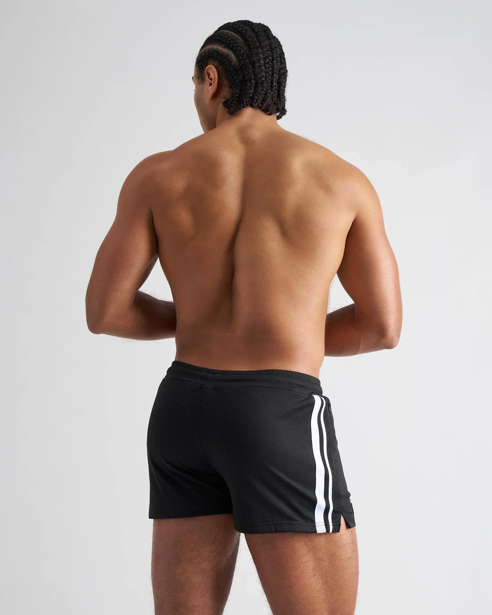 Black s.s.c. fraternity 3 mesh shorts with two vertical white stripes on the side made of breathable athletic mesh material