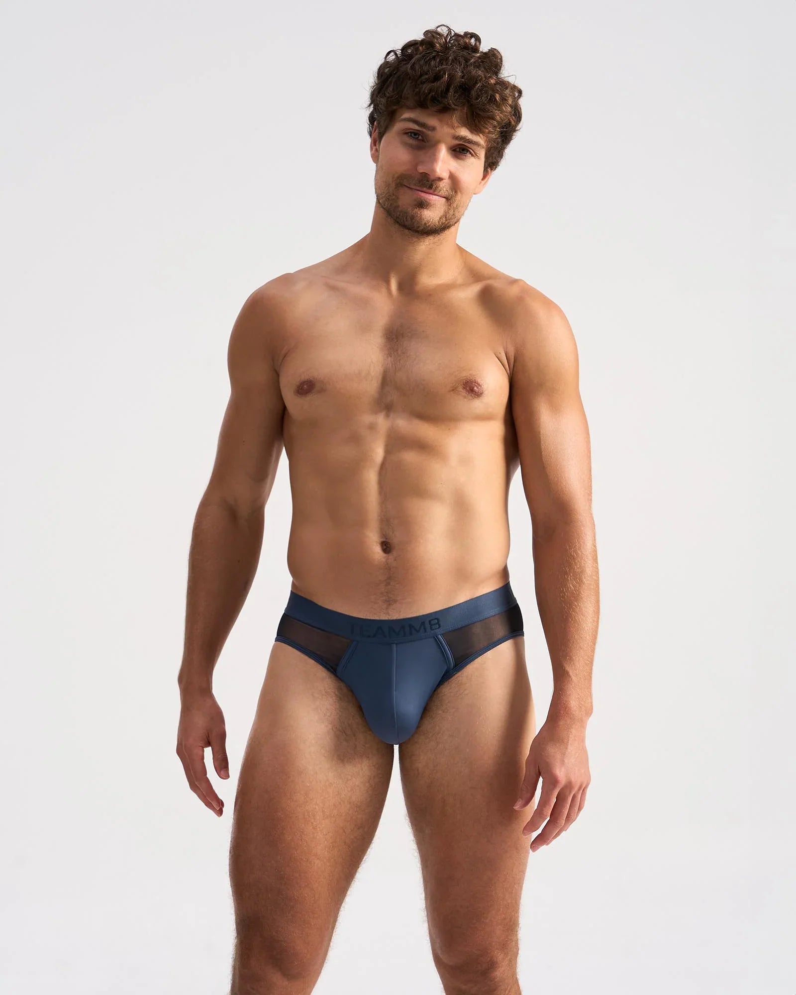 Men’s navy blue score sheer brief with mesh side panels offering breathable and supportive underwear fit