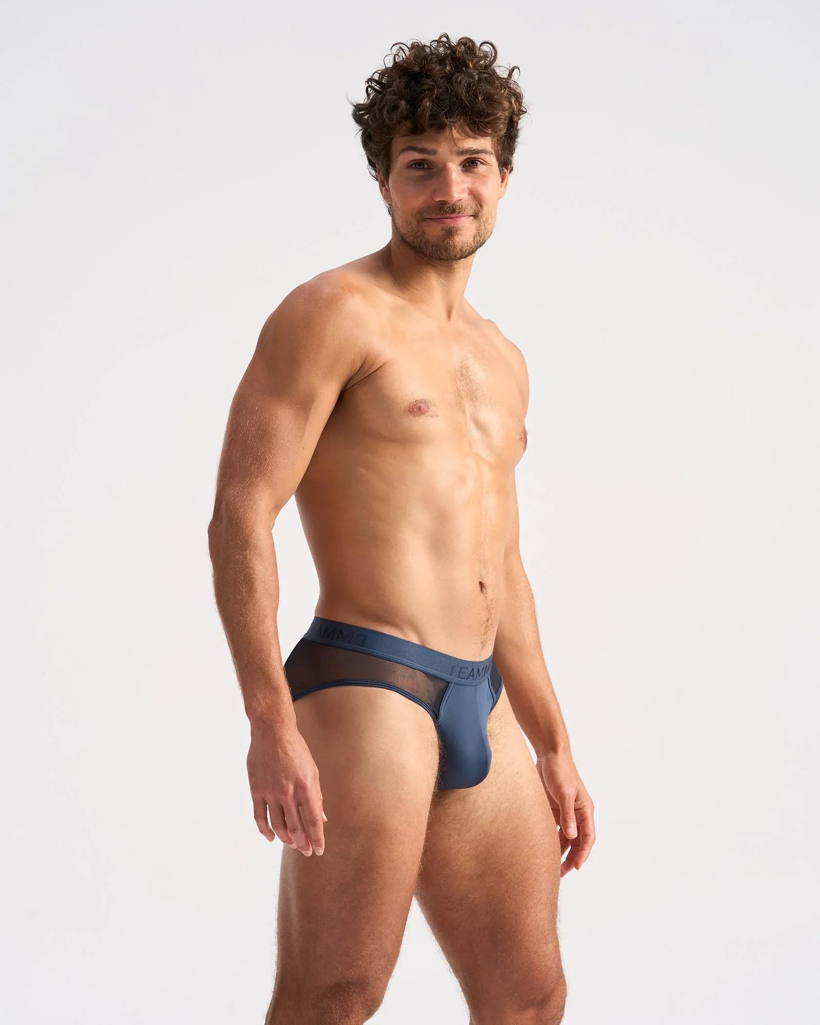 Navy blue score sheer brief with mesh trim featuring a sleek modern design for comfortable everyday wear