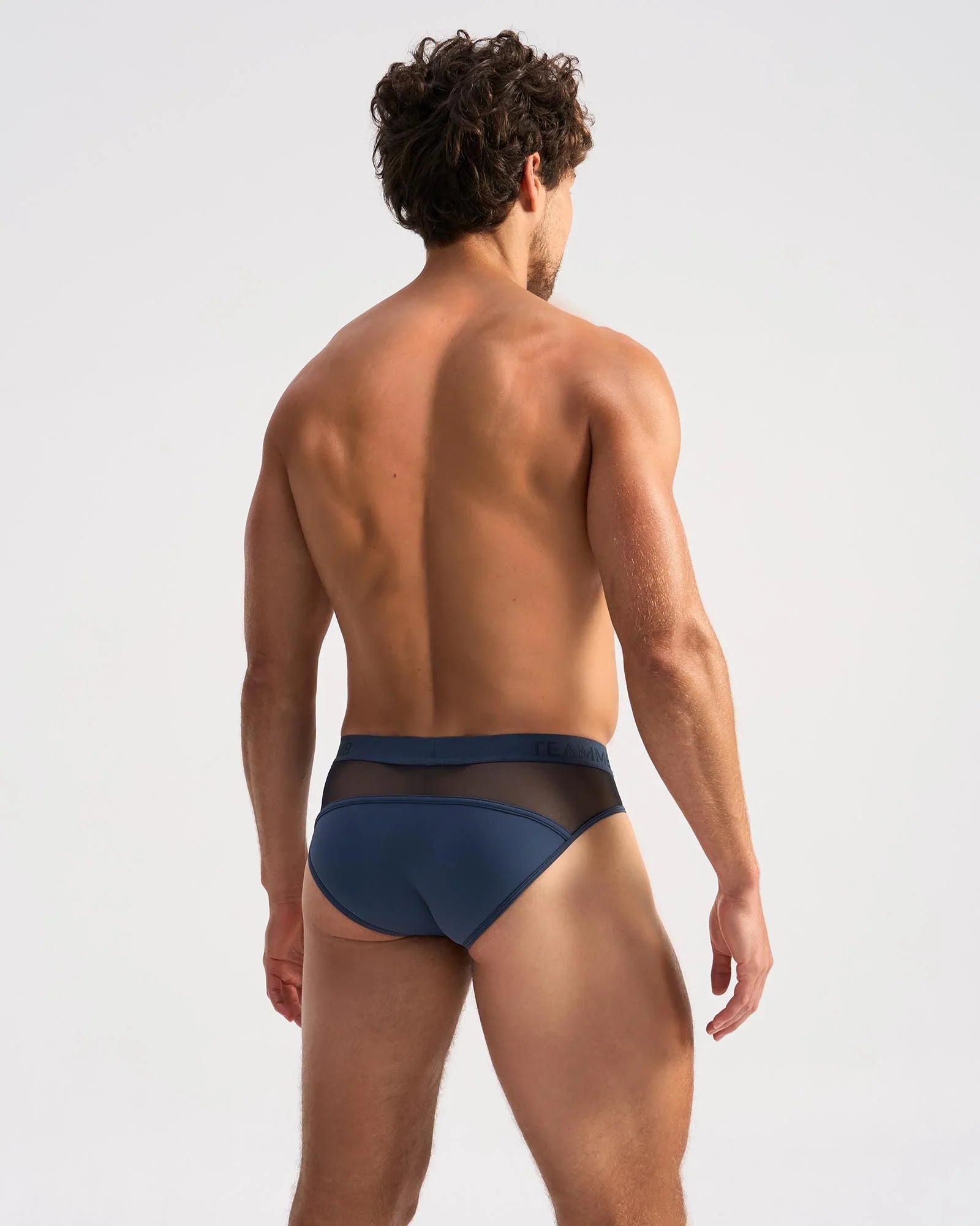 Navy blue score sheer brief with mesh trim made from lightweight breathable fabric for comfortable everyday wear