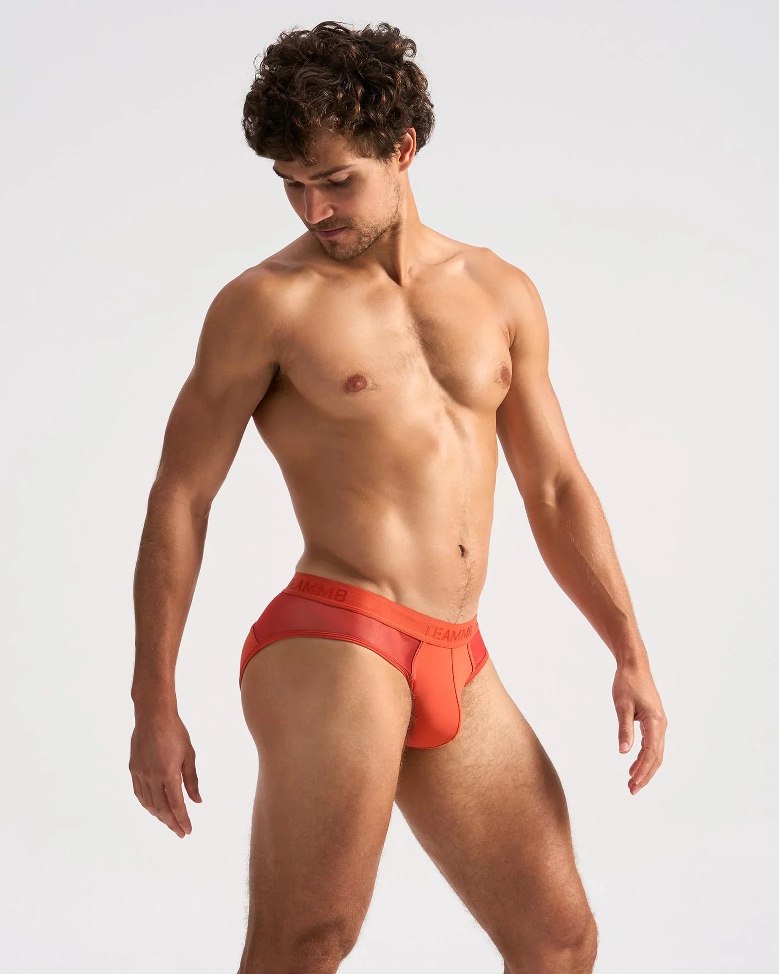 Orange calvin klein score sheer jock briefs featuring sheer fabric and a vibrant orange color