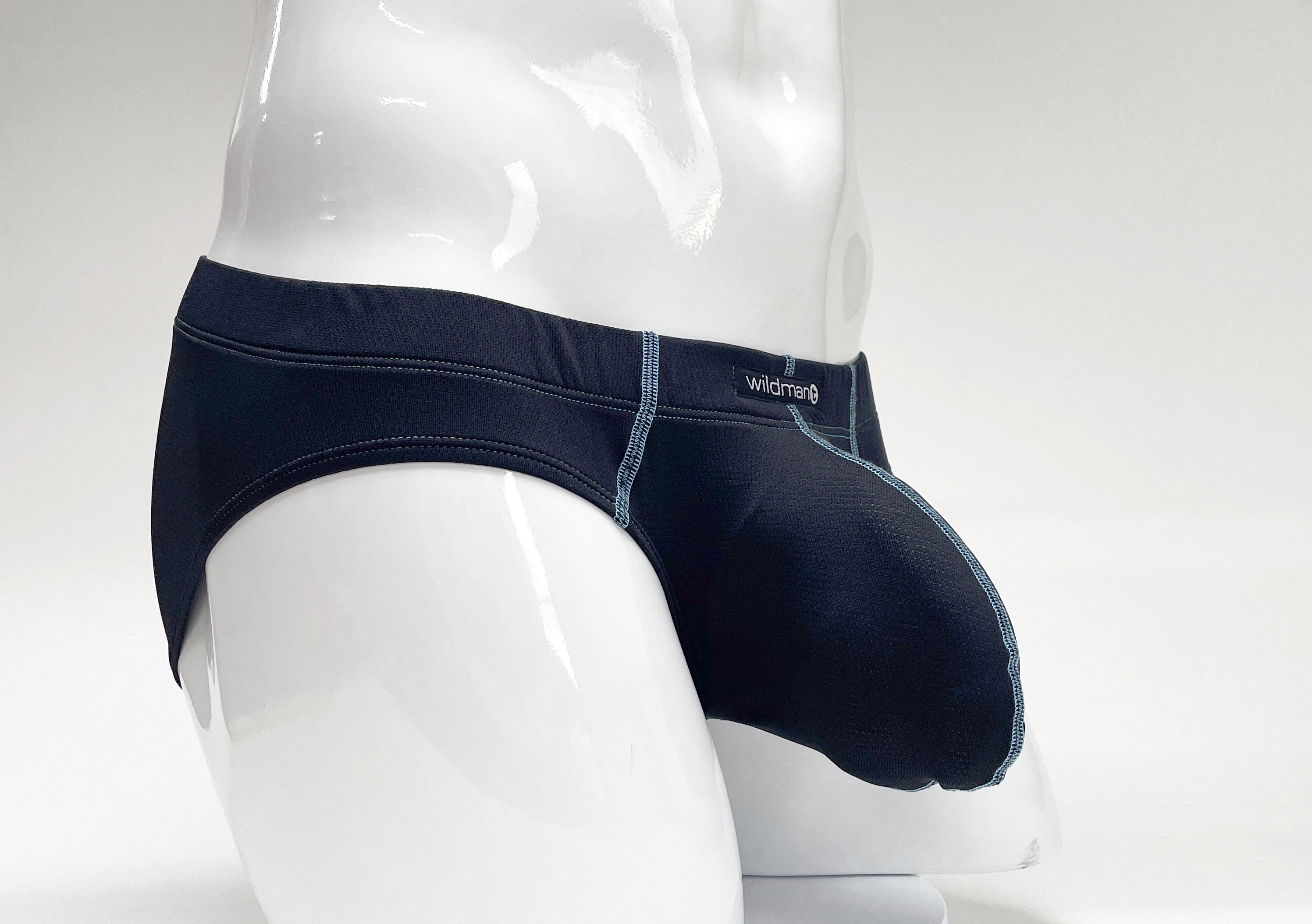 Stitch Big Boy pouch briefs in navy blue with light blue contrast stitching and a small Wildman logo on a mannequin.