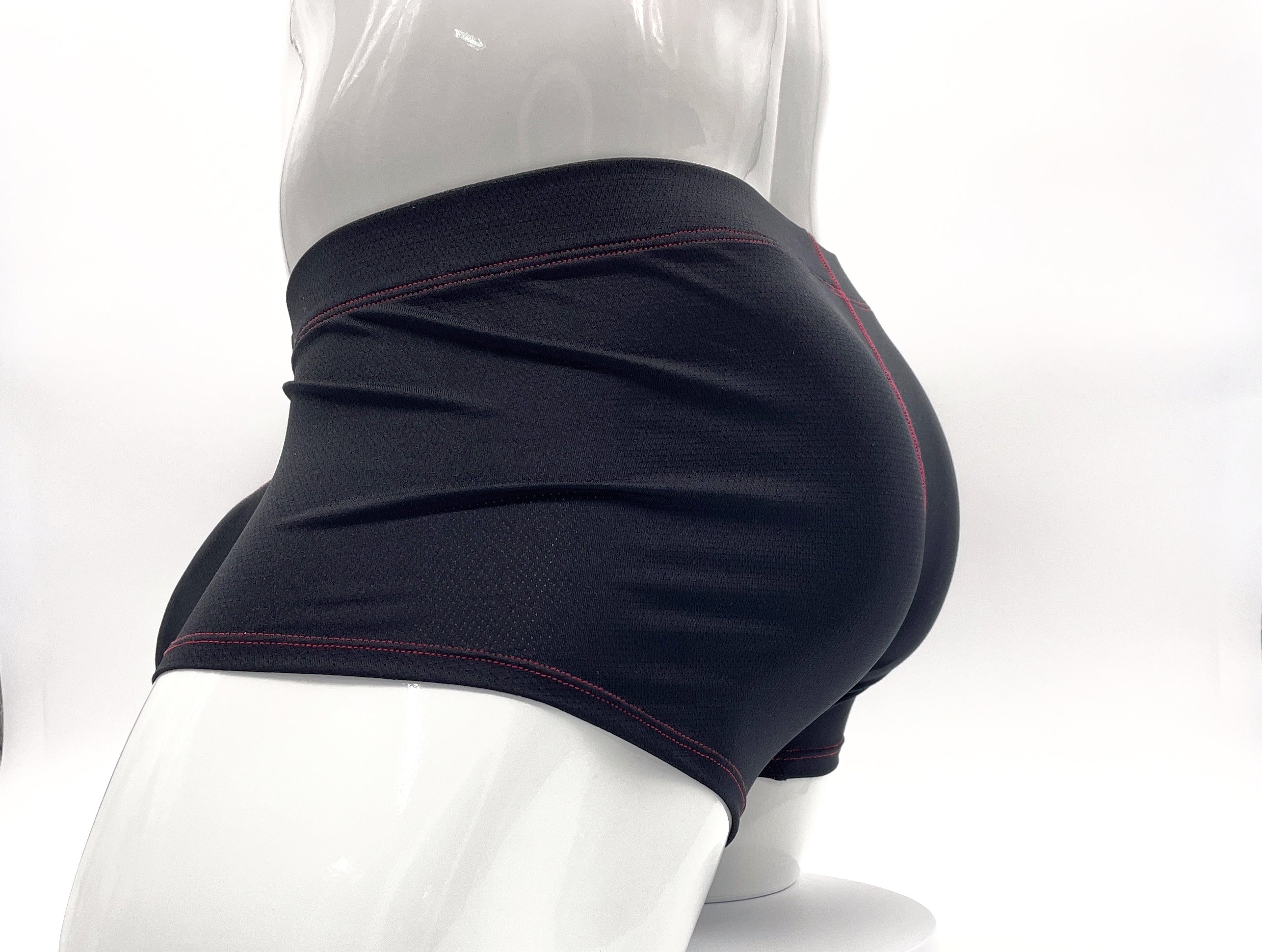 Black Big Boy pouch boxer briefs with red contrast stitching, shown from the side on a white mannequin.