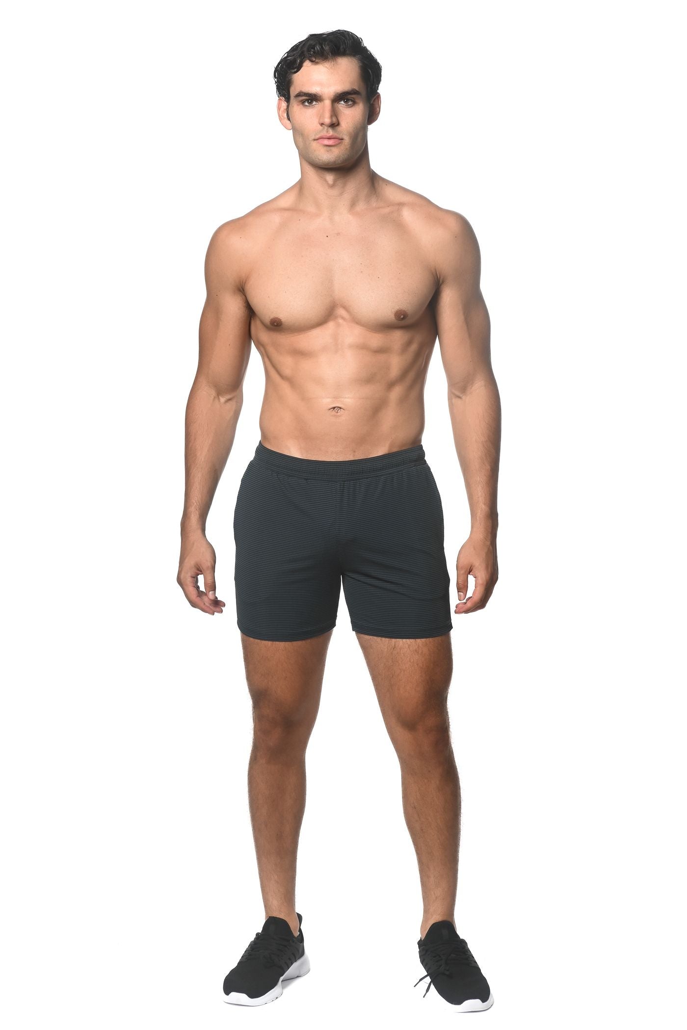 PANTALONES CORTOS ELÁSTICOS DE ALTO RENDIMIENTO CON RAYAS