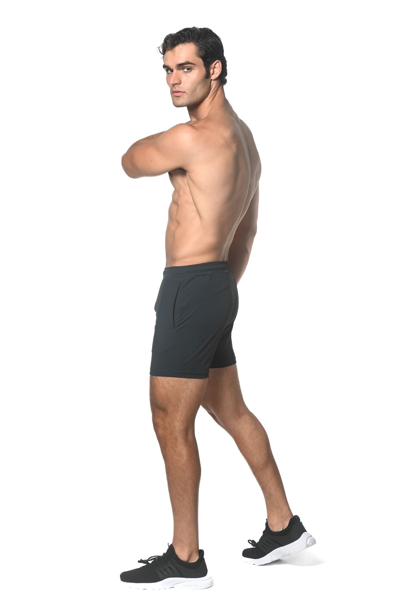 PANTALONES CORTOS ELÁSTICOS DE ALTO RENDIMIENTO CON RAYAS