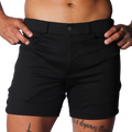 Slim-fit black shorts in a smooth, durable fabric with belt loops, a single button closure, and front pockets.