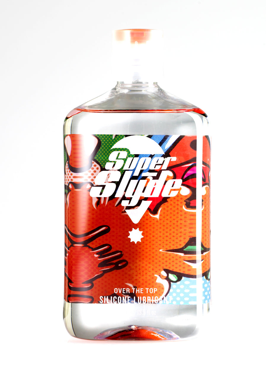 A vibrant transparent bottle of SuperSlyde silicone lubricant with a bold orange and red comic-style label