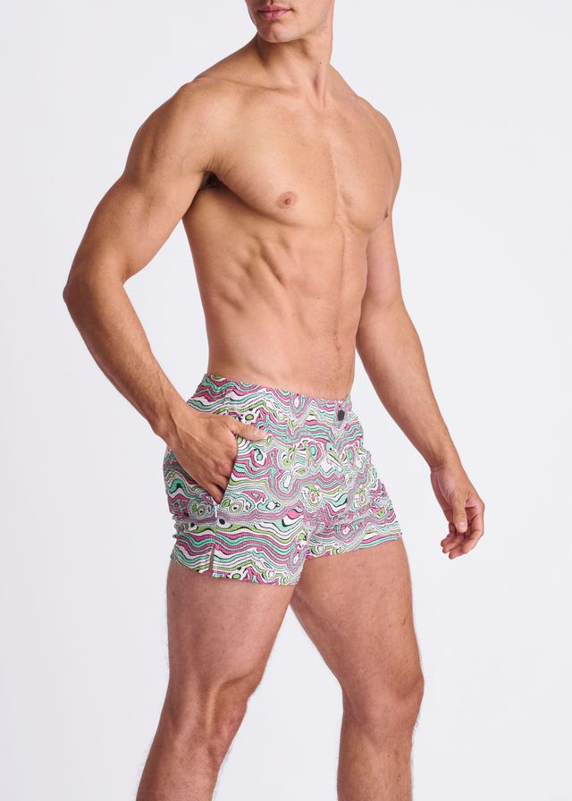 Men’s swirls print seersucker swim shorts with mesh lining featuring vibrant pink green and white swirling pattern