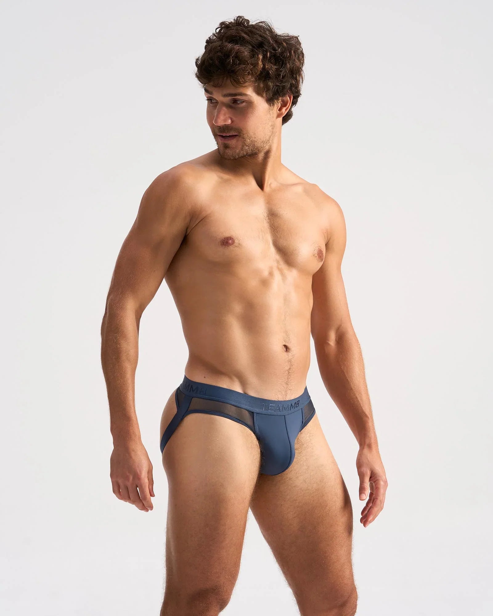 Blue score sheer jock athletic briefs with mesh side panels and subtle brand logo on waistband