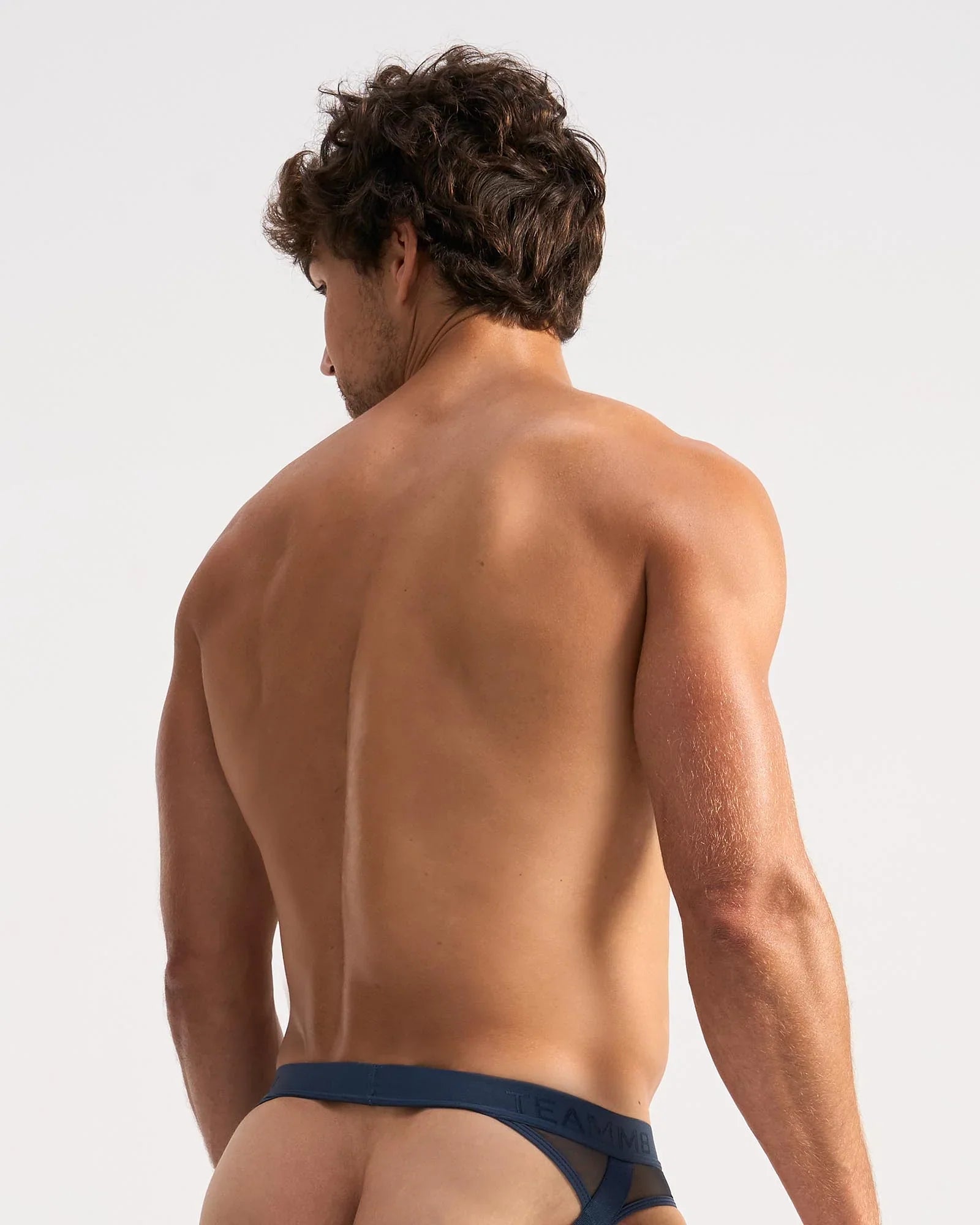 Navy blue score sheer jock mesh briefs with solid waistband designed for comfort and breathability