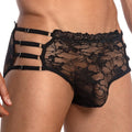 Black lace Secret Male SMI029 bikini brief with intricate floral patterns and four adjustable silver-toned metal buckles
