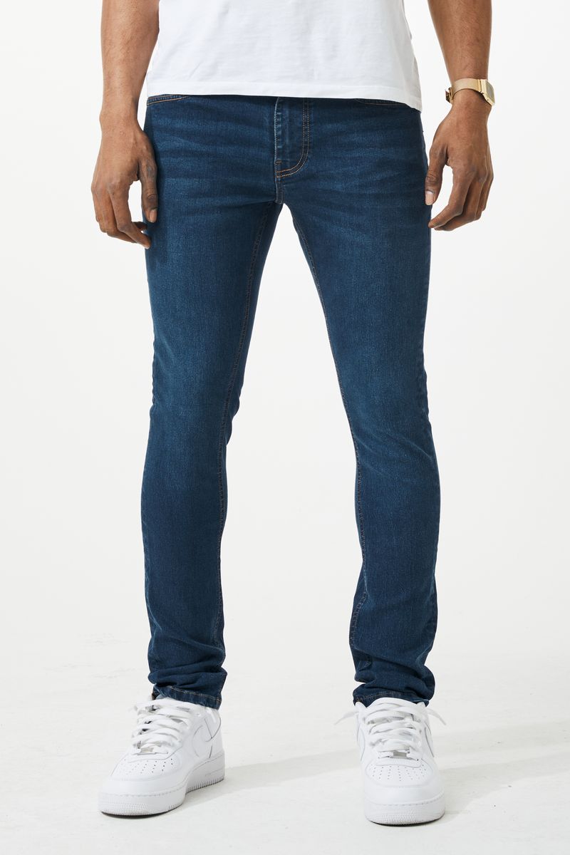 Skinny fit denim jeans in dark blue slim-fit with classic five-pocket design and subtle thigh fading