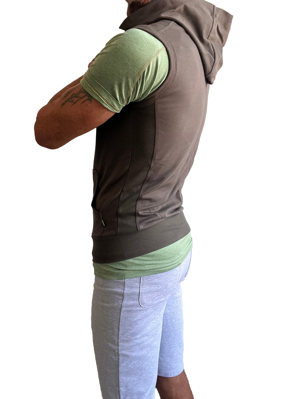 Brown hooded sleeveless vest with ribbed waistband and side pockets designed for yoga in army green color